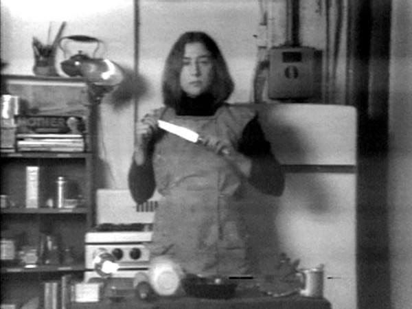 A Black and white video still from Martha Rosler's