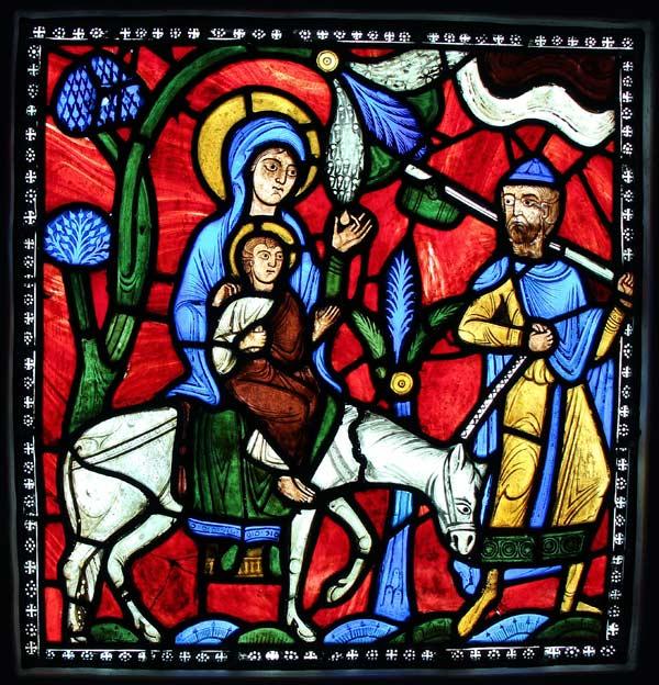 The Flight into Egypt, from the Infancy of Christ Window (?), ca. 1145. Abbey of Saint-Denis, France. Pot-metal glass. Collection of Glencairn Museum (03.SG.114). Photograph courtesy of Glencairn Museum