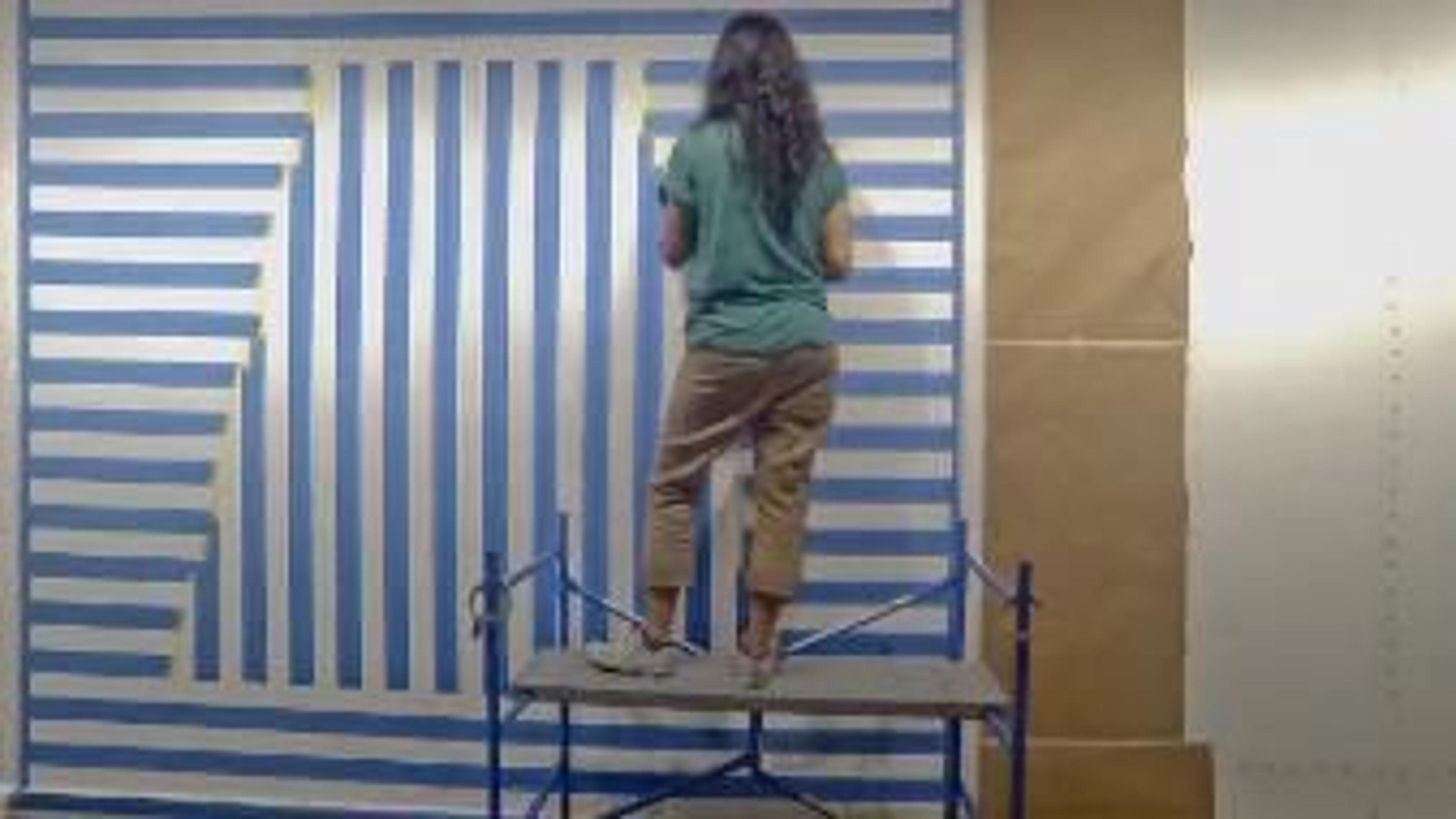 People installing Sol LeWitt's work in the gallery