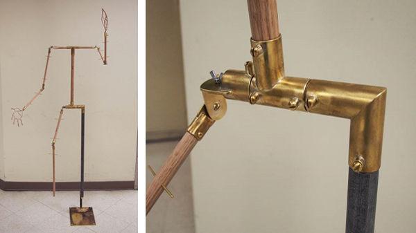Two views of the brass and wood mannequin mount. Photos courtesy of Matthew Cumbie
