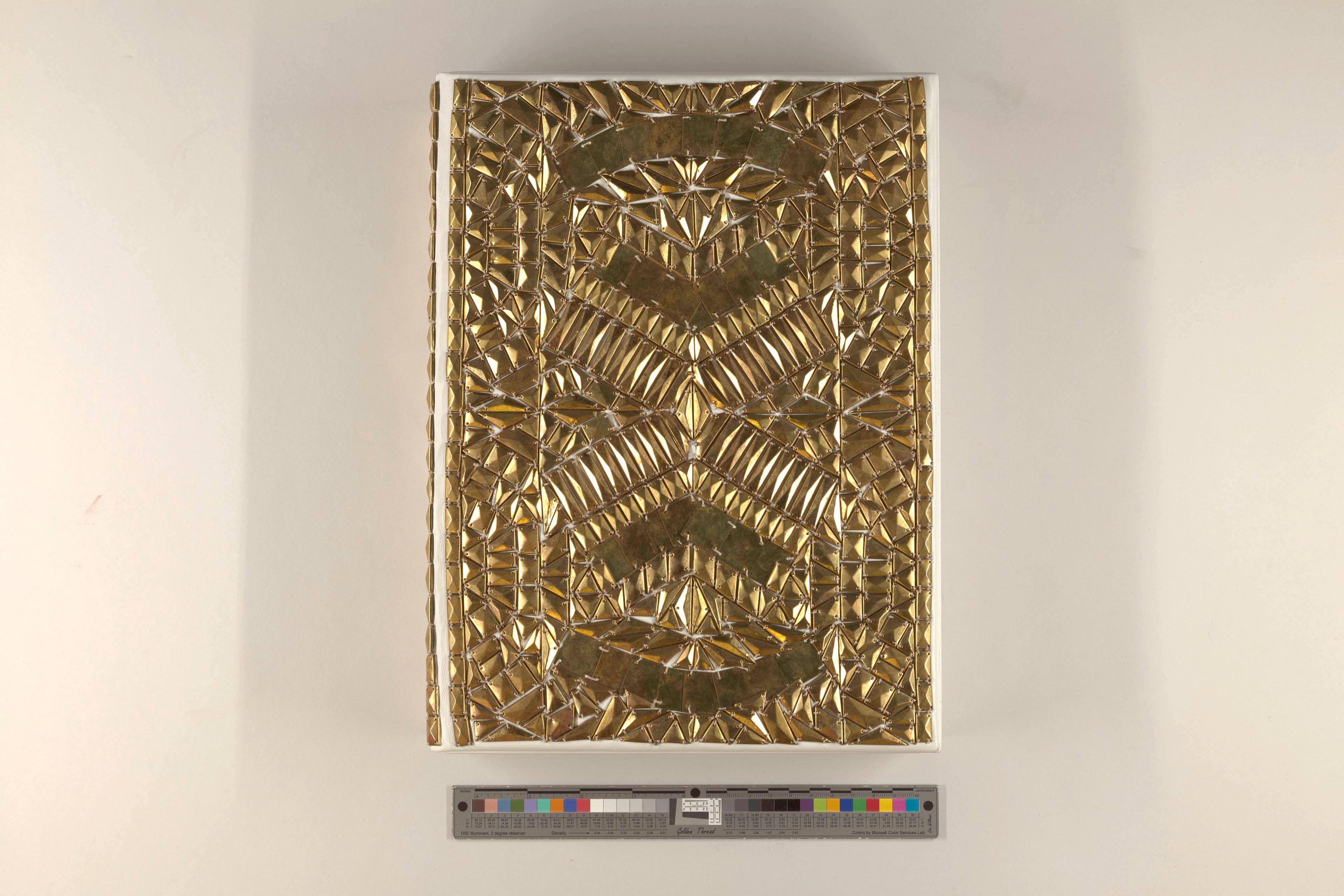 Gold, patterned cover