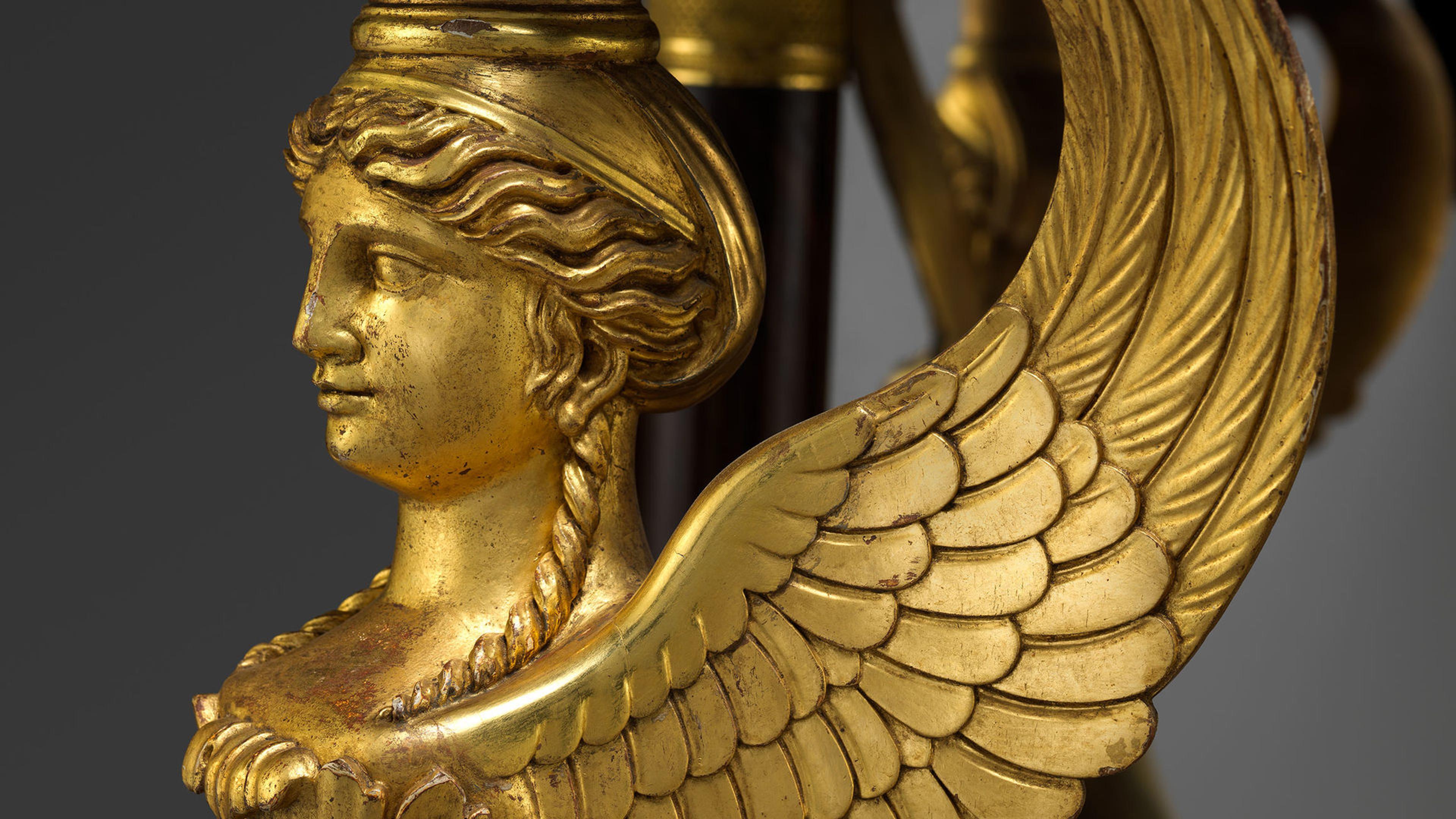 Close up of a winged gilded caryatid in a pier table by Charles-Honoré Lannuier
