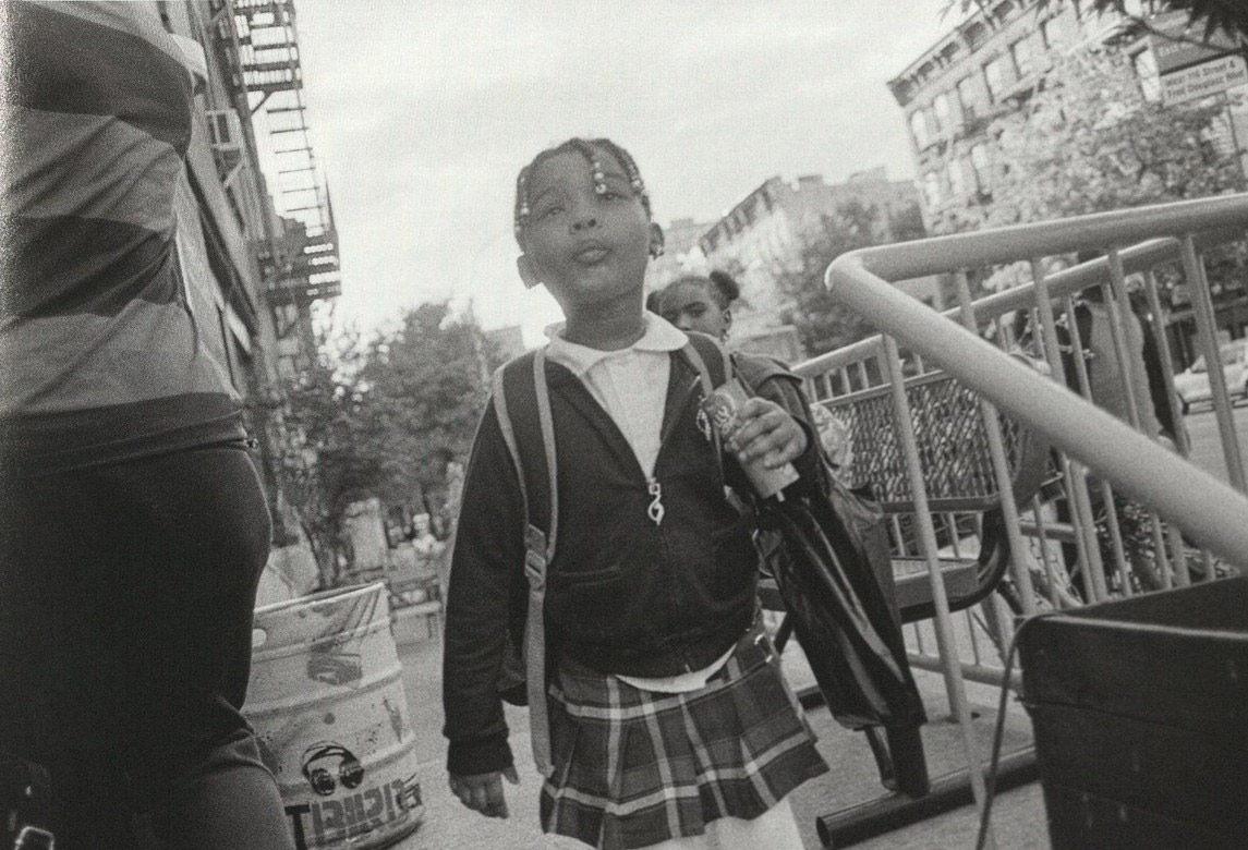 Black and white photograph of school child
