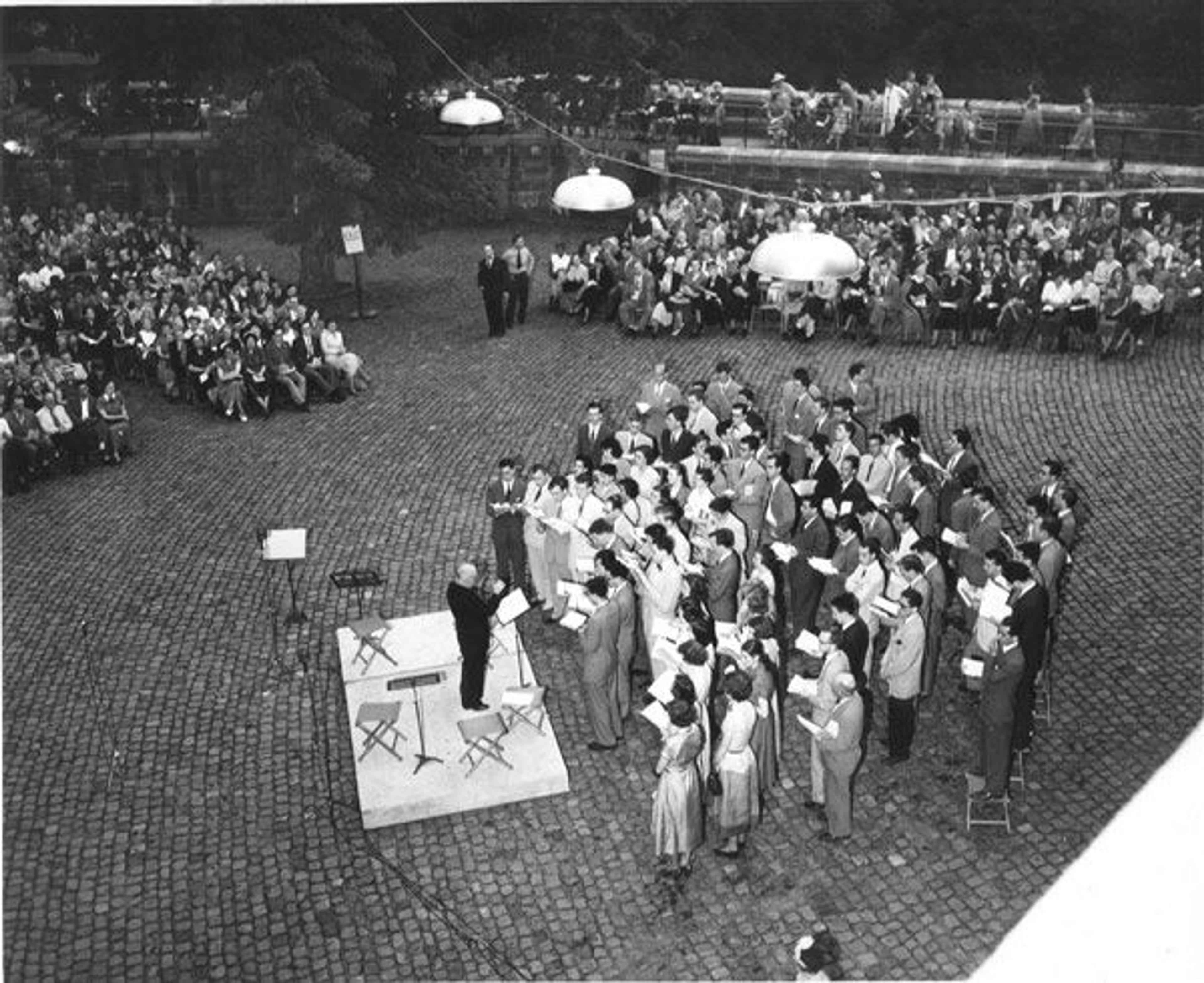 Paul Hindemith conducting the Yale University Collegium Musicum during a Member concert at The Cloisters museum and gardens, June 4, 1951