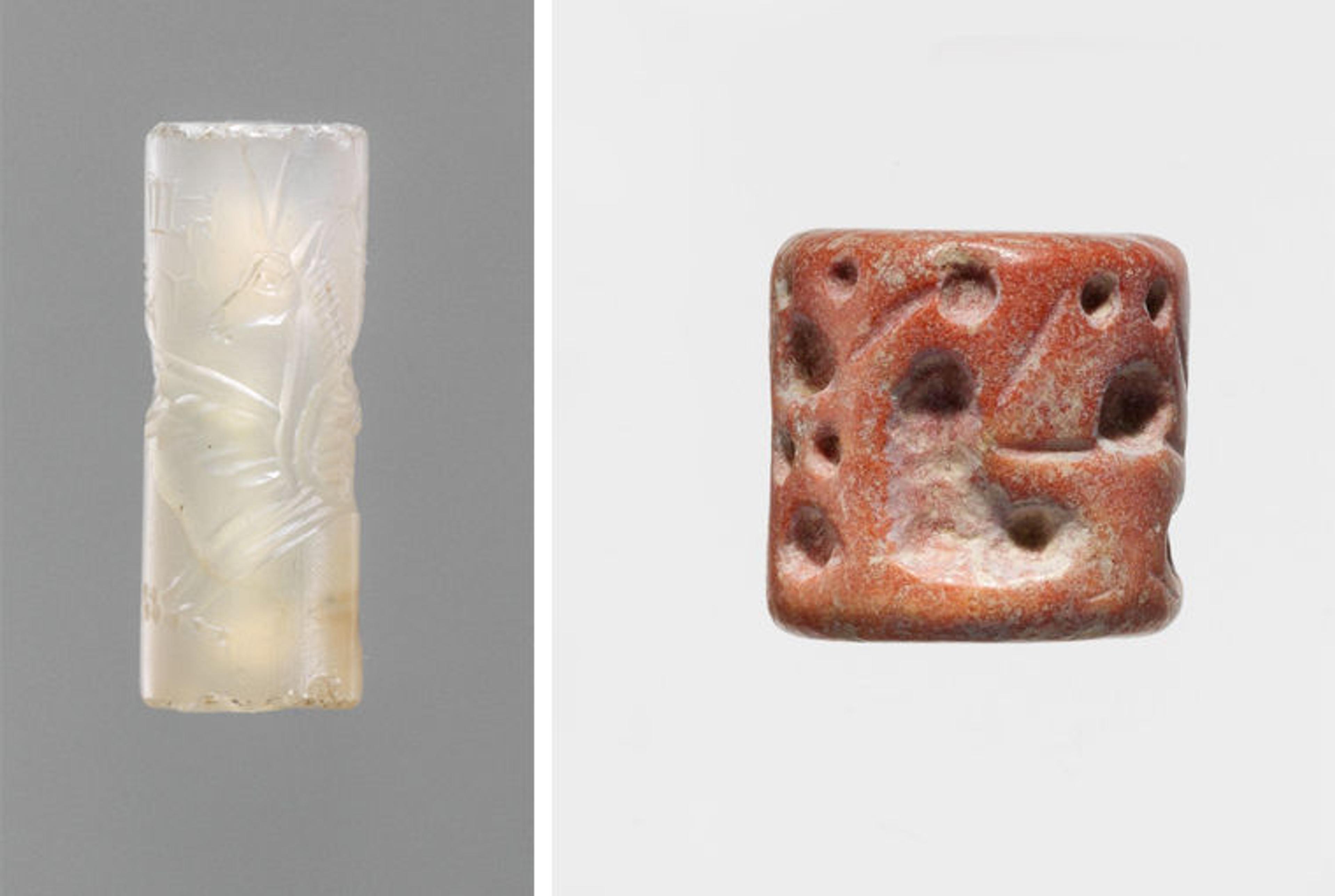 A thin translucent cylinder seal next to a stubby (short and thick) red one.