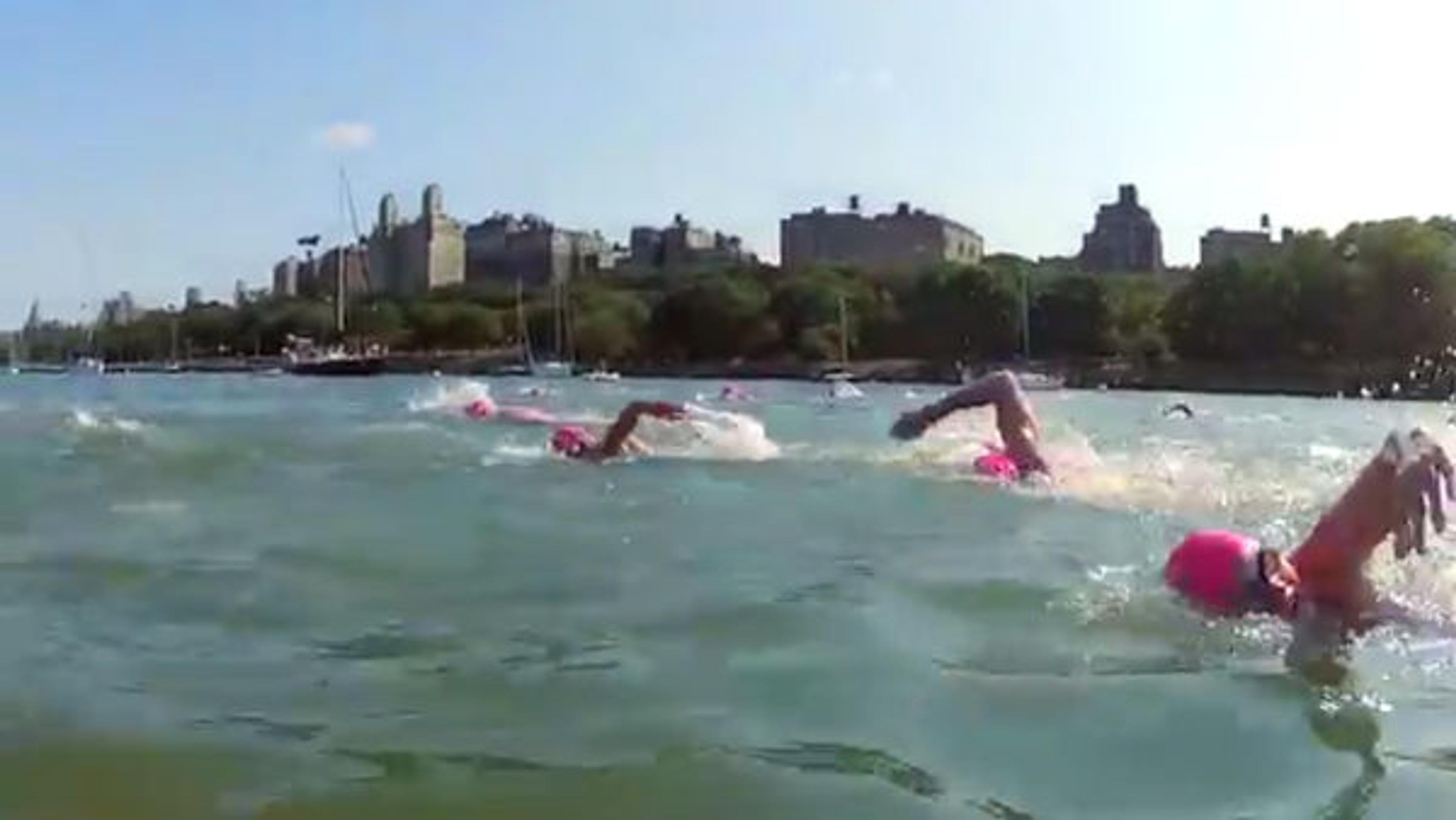 People swimming up the Hudson River