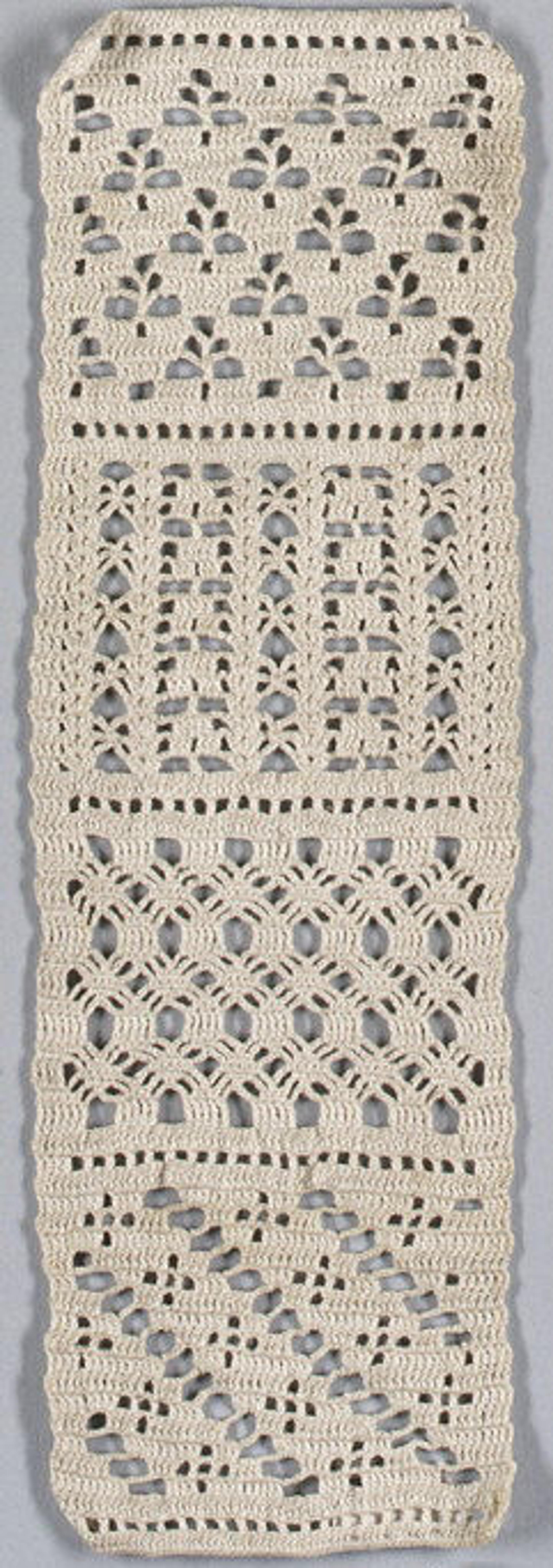 A tan crochet sampler