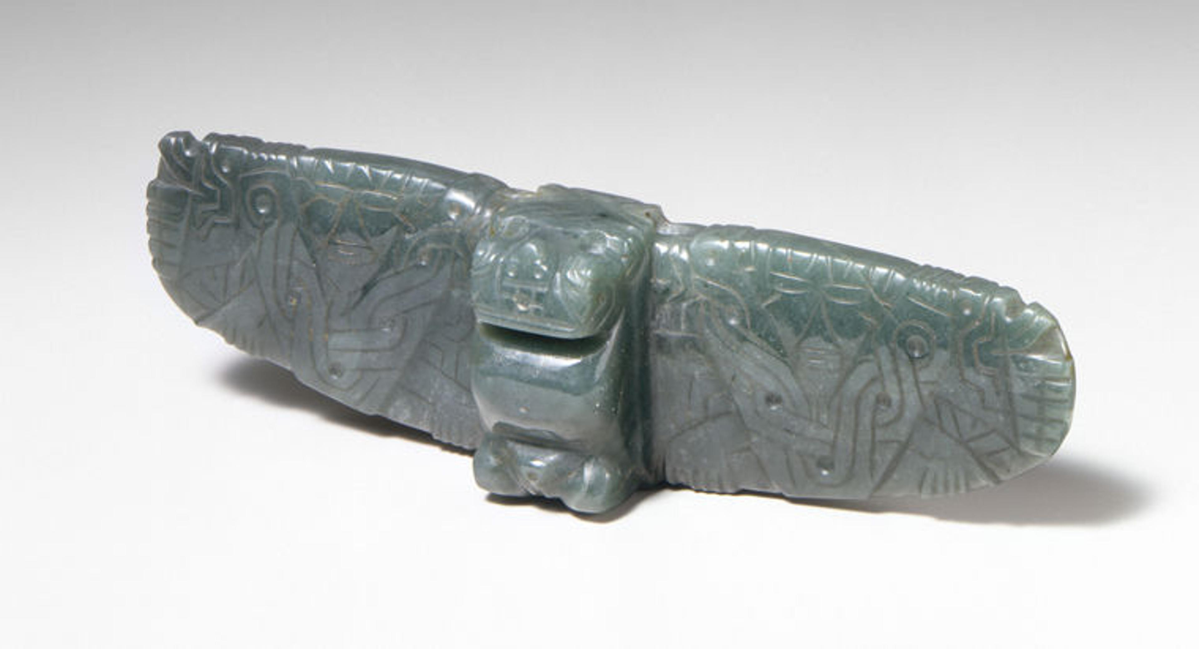 A jadeite pendant from the ancient Americas in the form of a bat