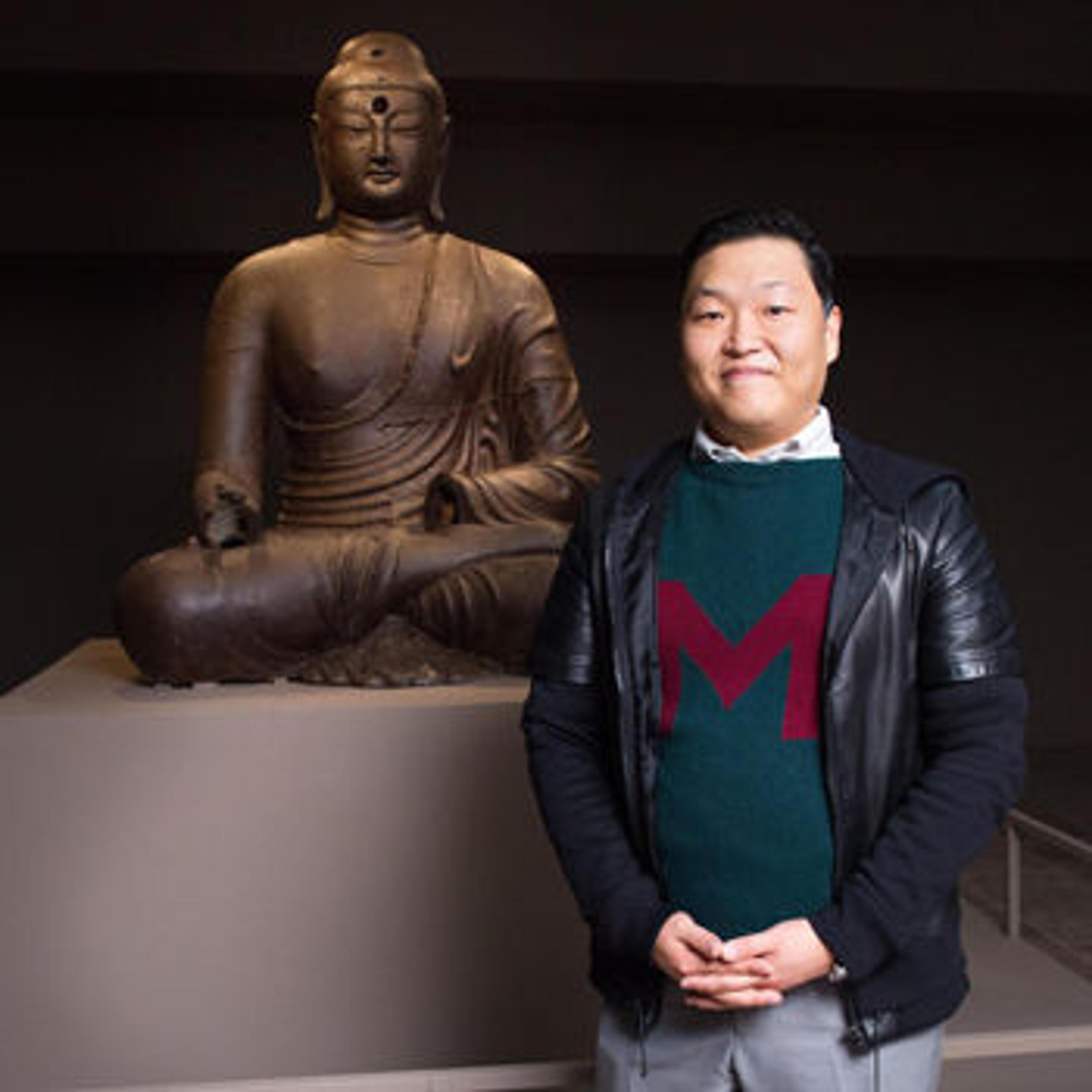 Psy with Iron Buddha