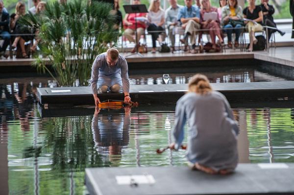 Alarm Will Sound performs Kate Soper's I Was Here I Was I at The Temple of Dendur in The Sackler Wing. Photo by Stephanie Berger