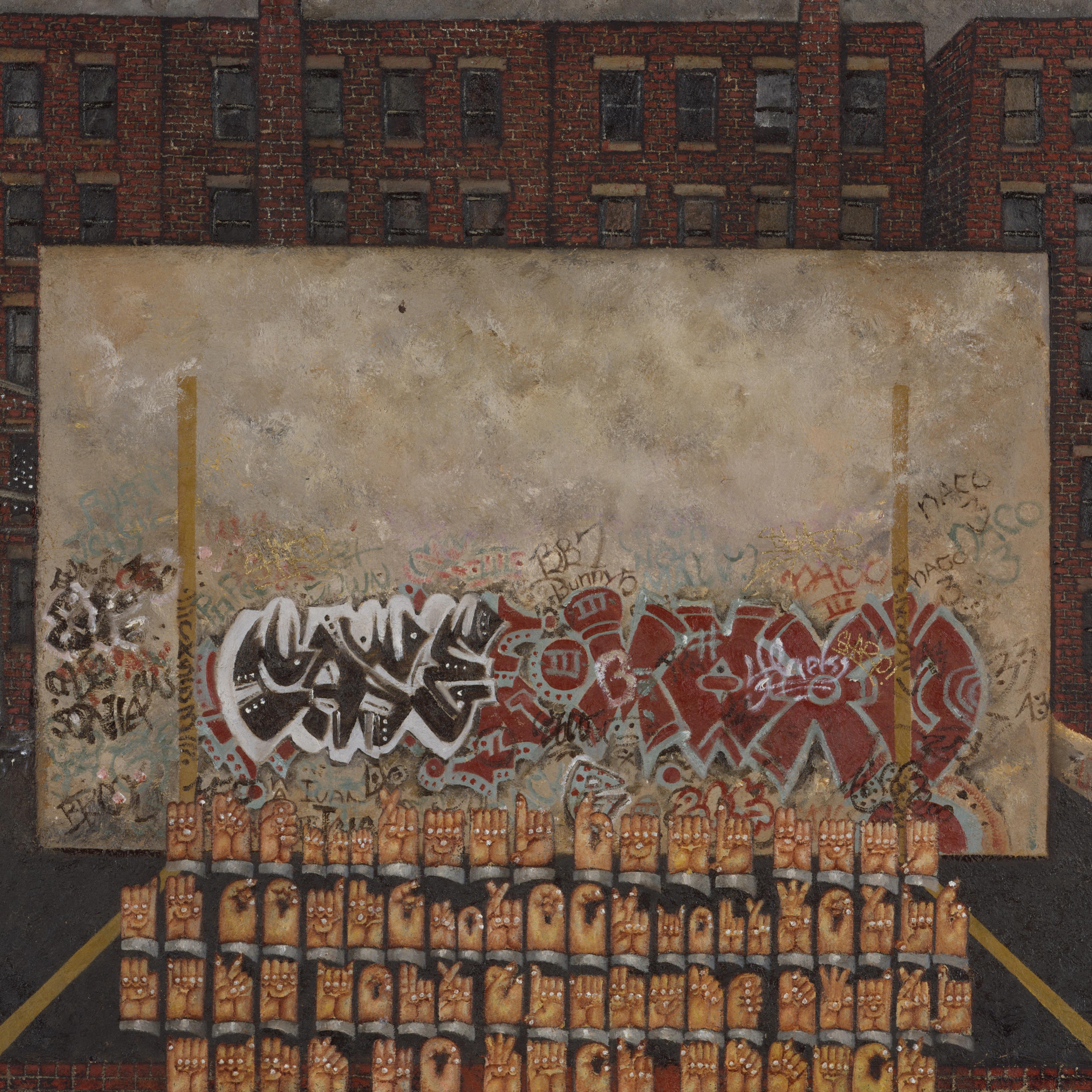 A graffitied concrete wall in a blacktop court, surrounded by chain-link fencing. Rows of hands expressing different signs fill the court in front of the wall.