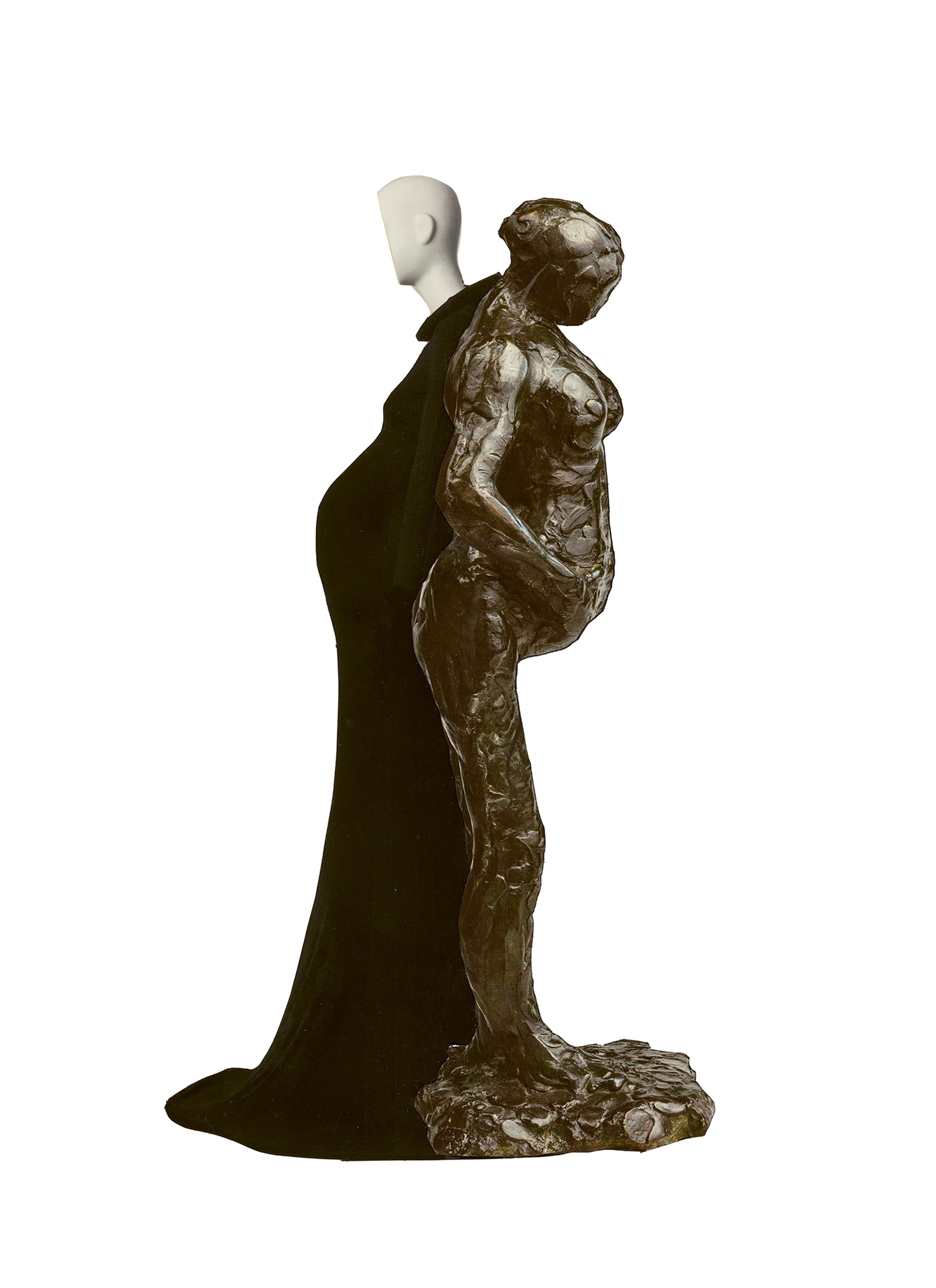 A modern sculpture juxtaposes a sleek, white mannequin against a rugged, textured bronze figure