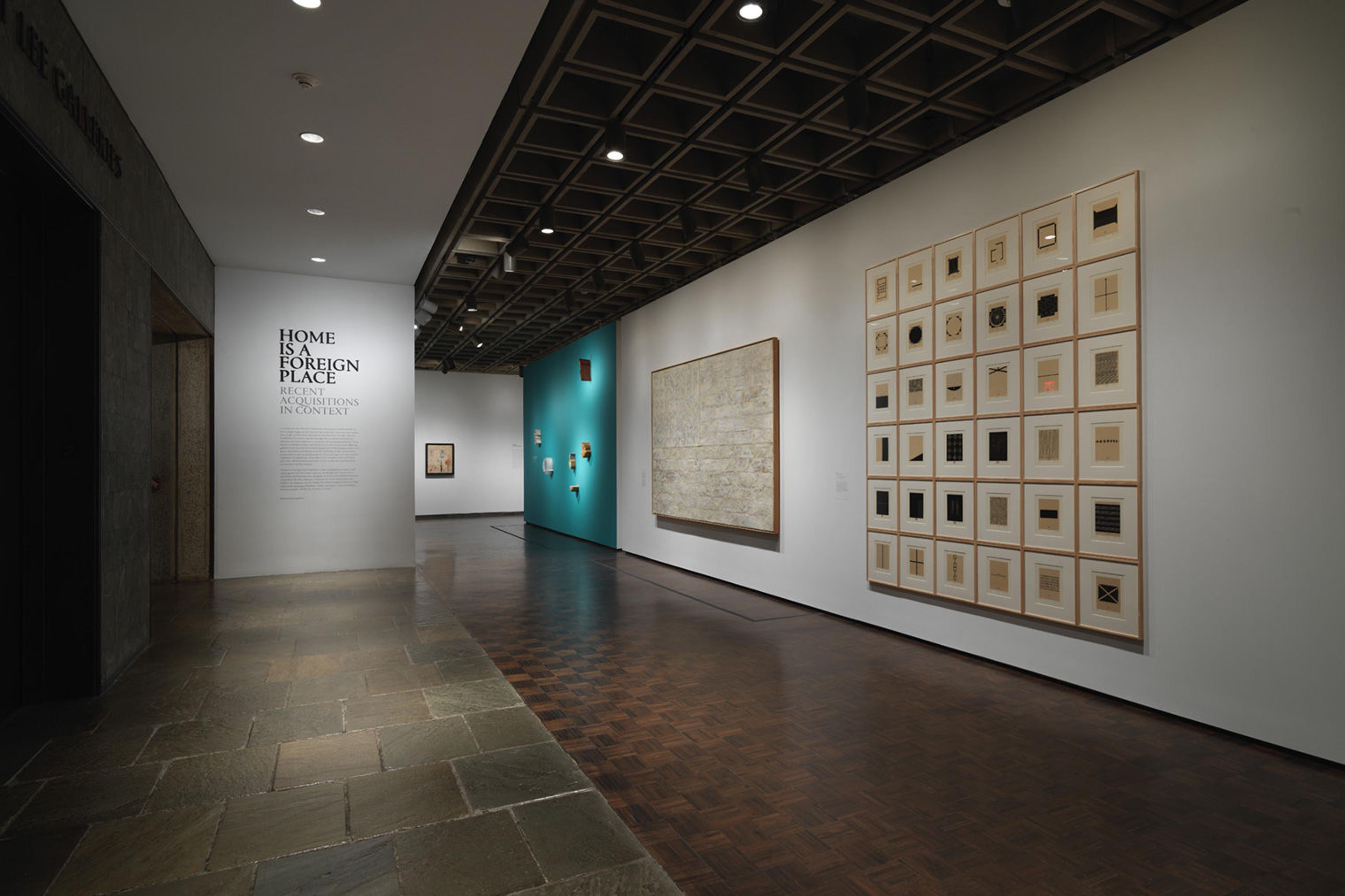 Gallery view of the exhibition, Home is a Foreign Place at The Met Breuer.