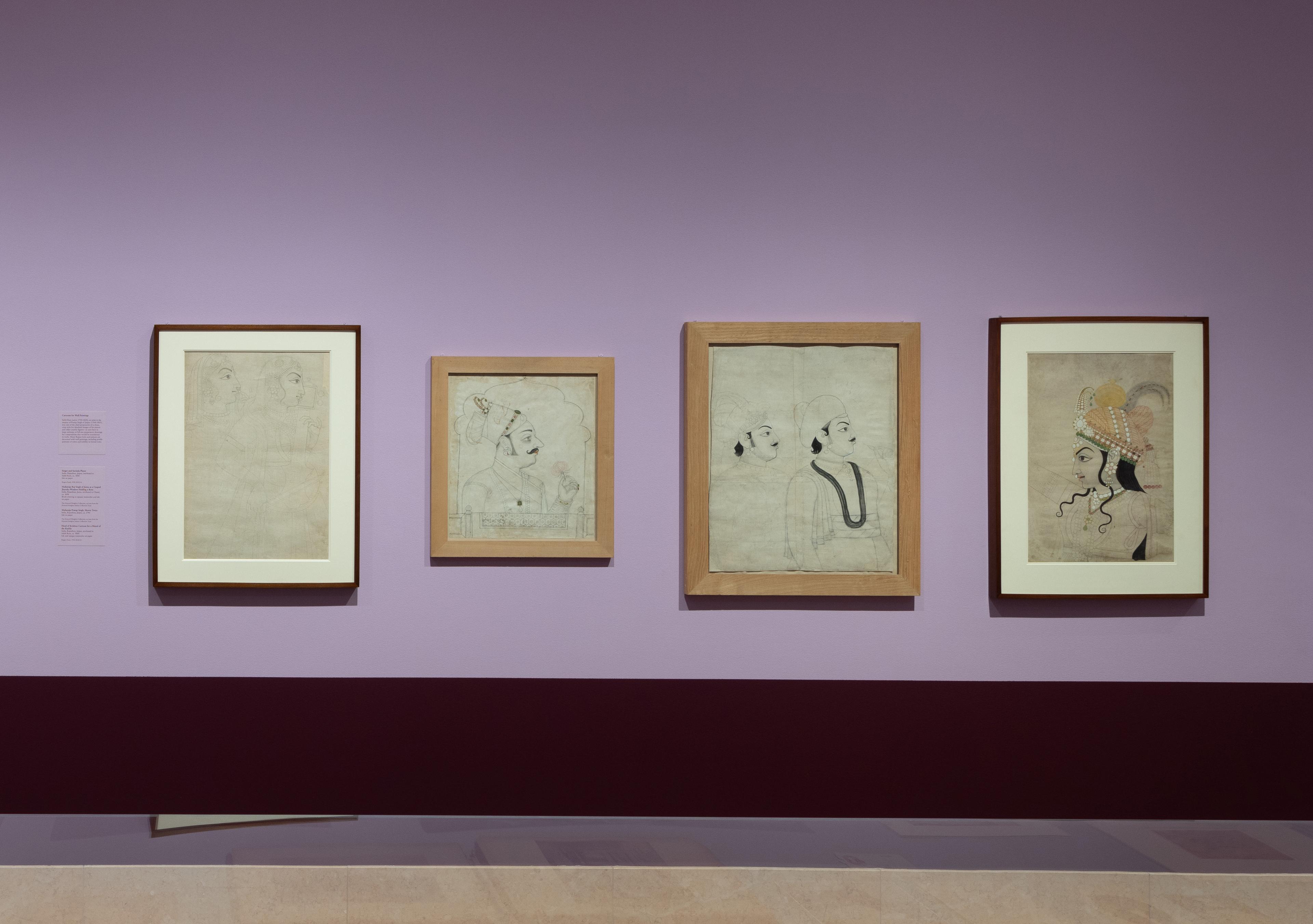 An art gallery room with purple walls displays framed historical paintings. The pieces are varied in size, and a glass display case is partially visible.