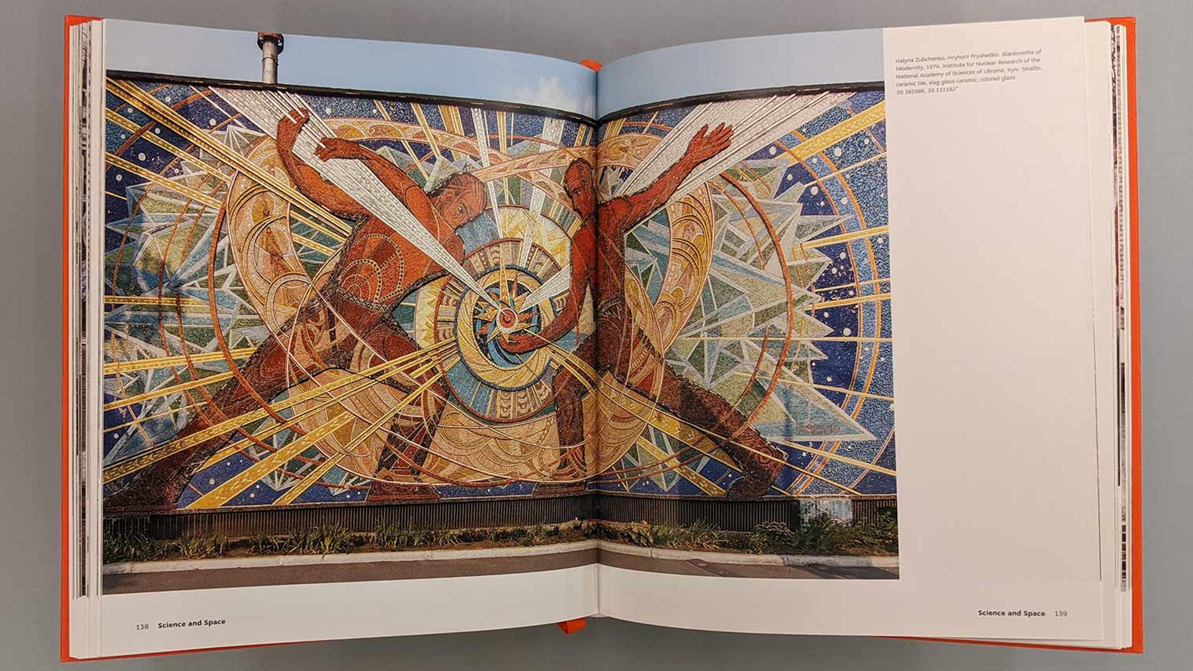 Futurist mosaic showing two men wielding colored rays around a gear-like spiral