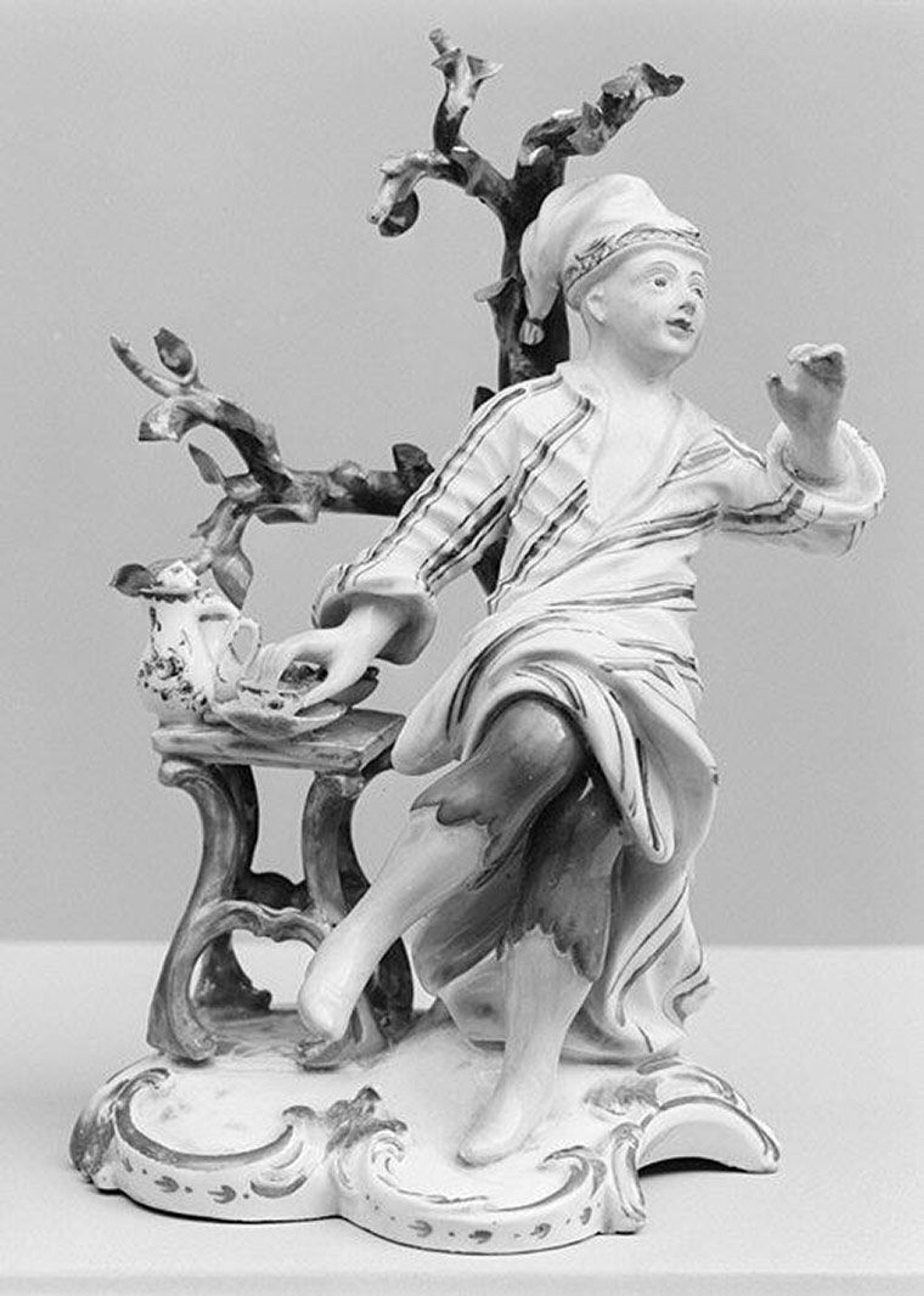 Ceramic piece of man with coffee set