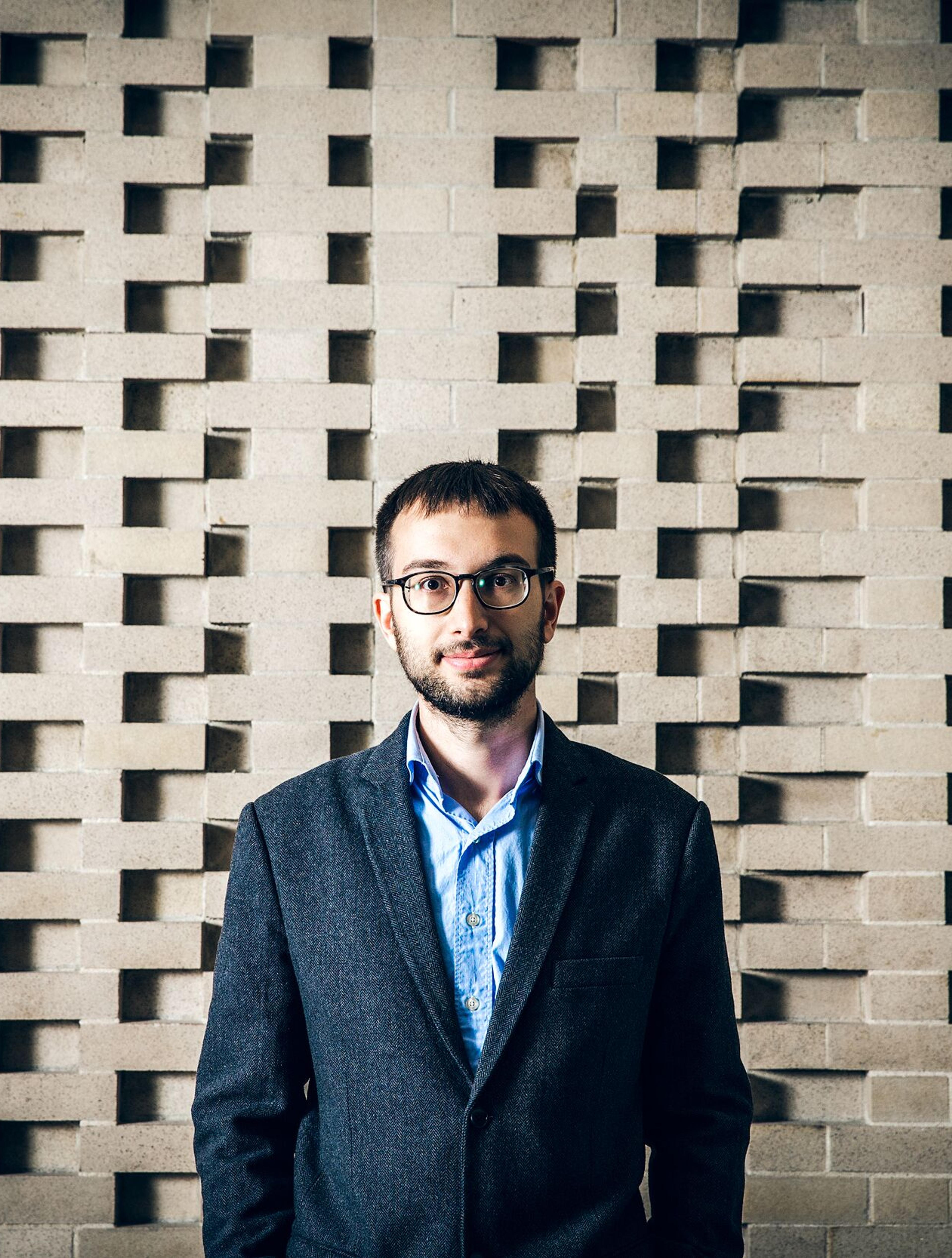 Headshot of Raphael Koenig