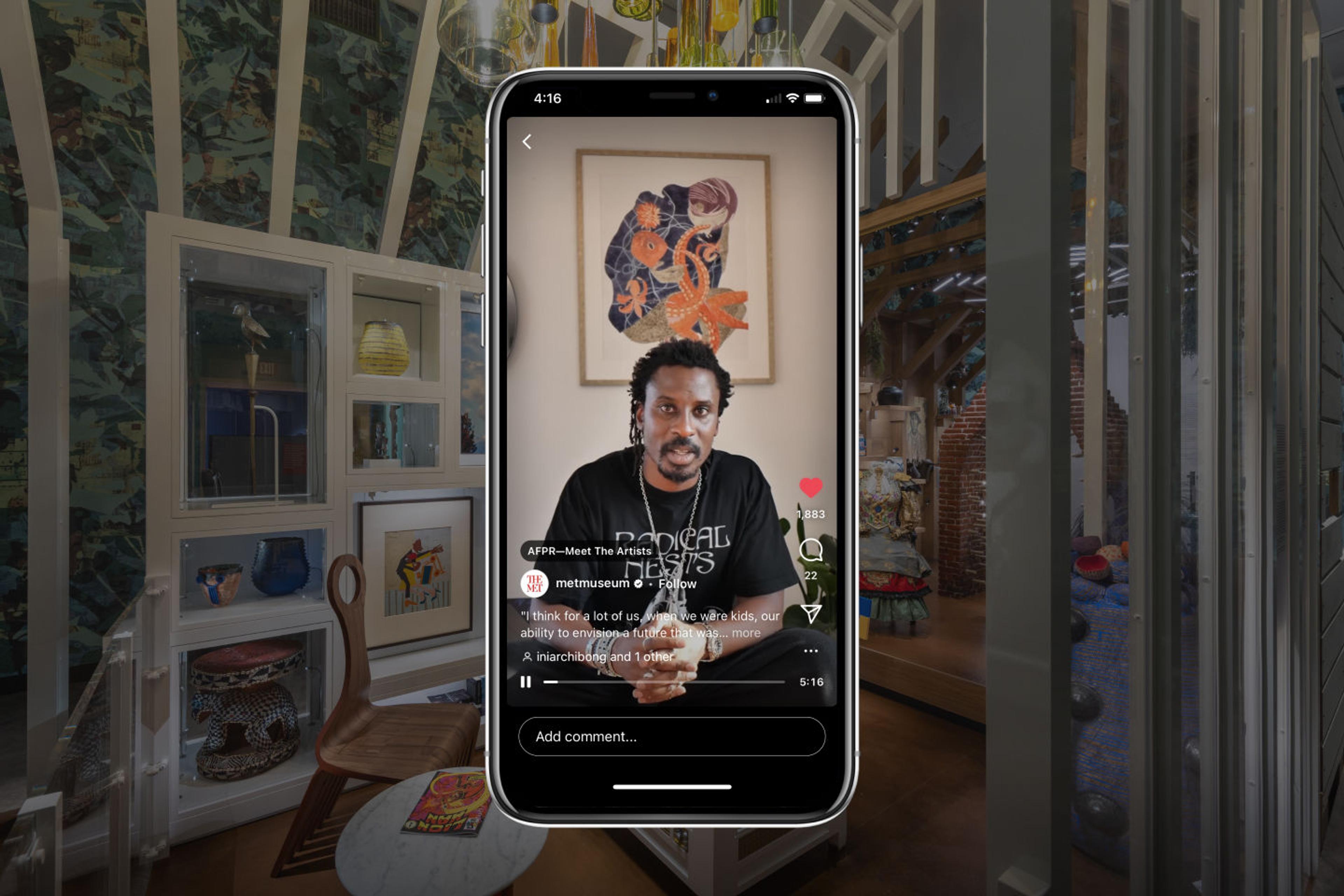 iPhone screenshot of Ini Archibong in front of the Afrofuturist Period Room