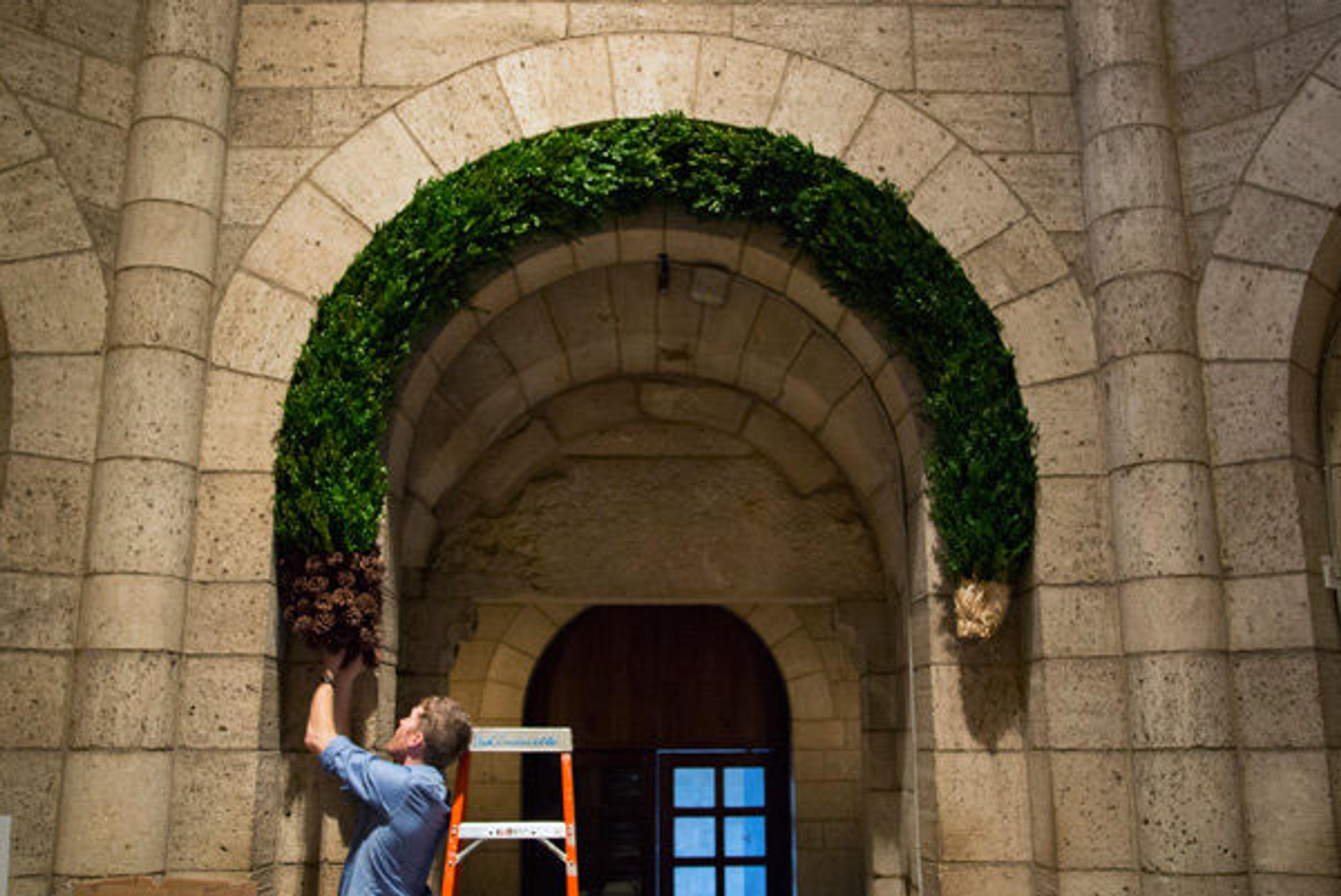 Caleb adding the corbels to the arch