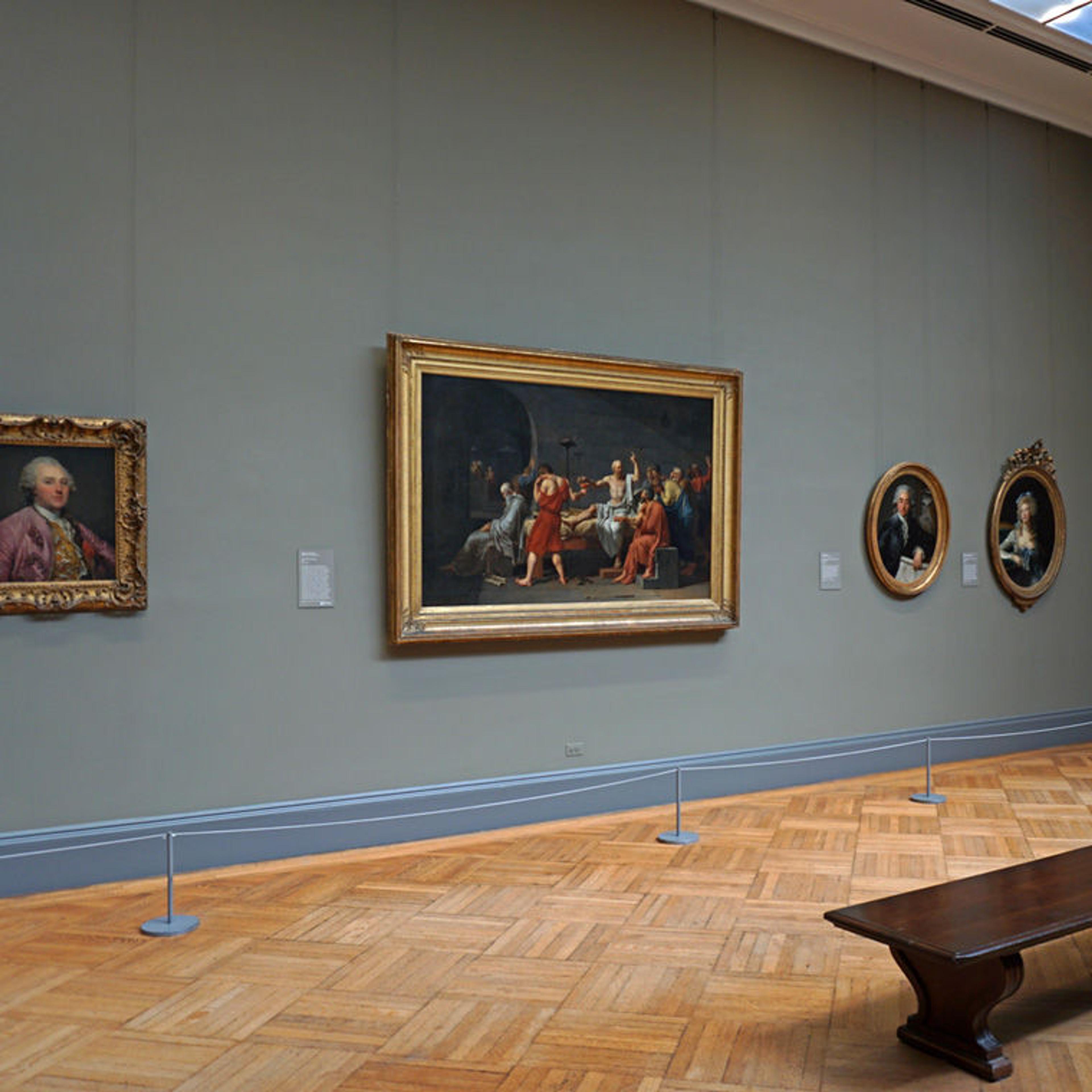 One of The Met's European Paintings galleries, with Jacques Louis David's "Death of Socrates" at the center