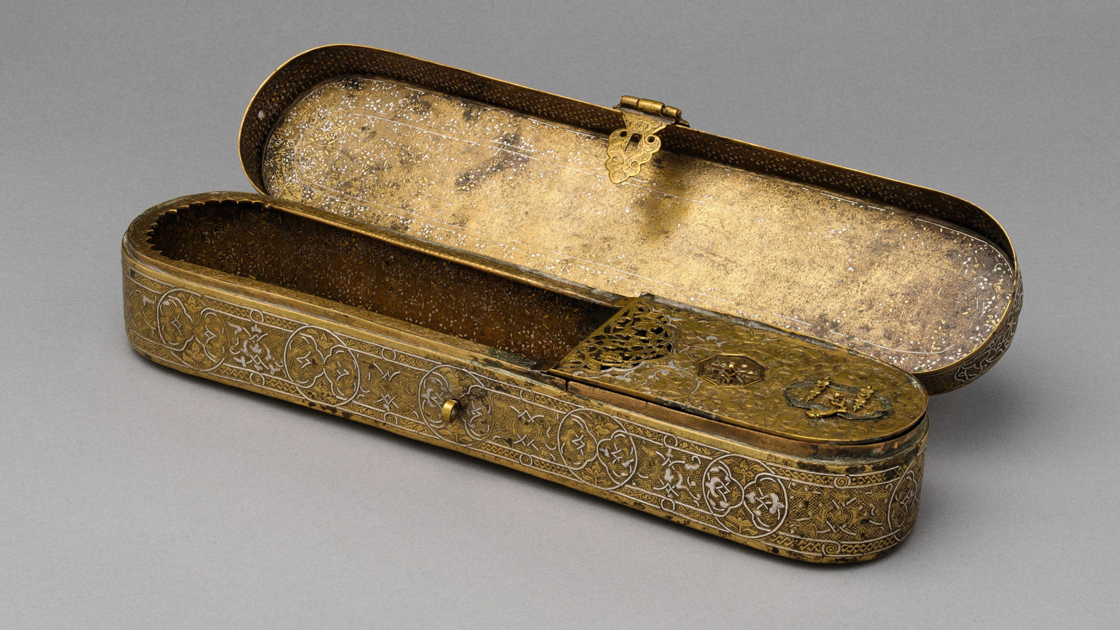 Brass Pen Box decorated with interlocking medallions 