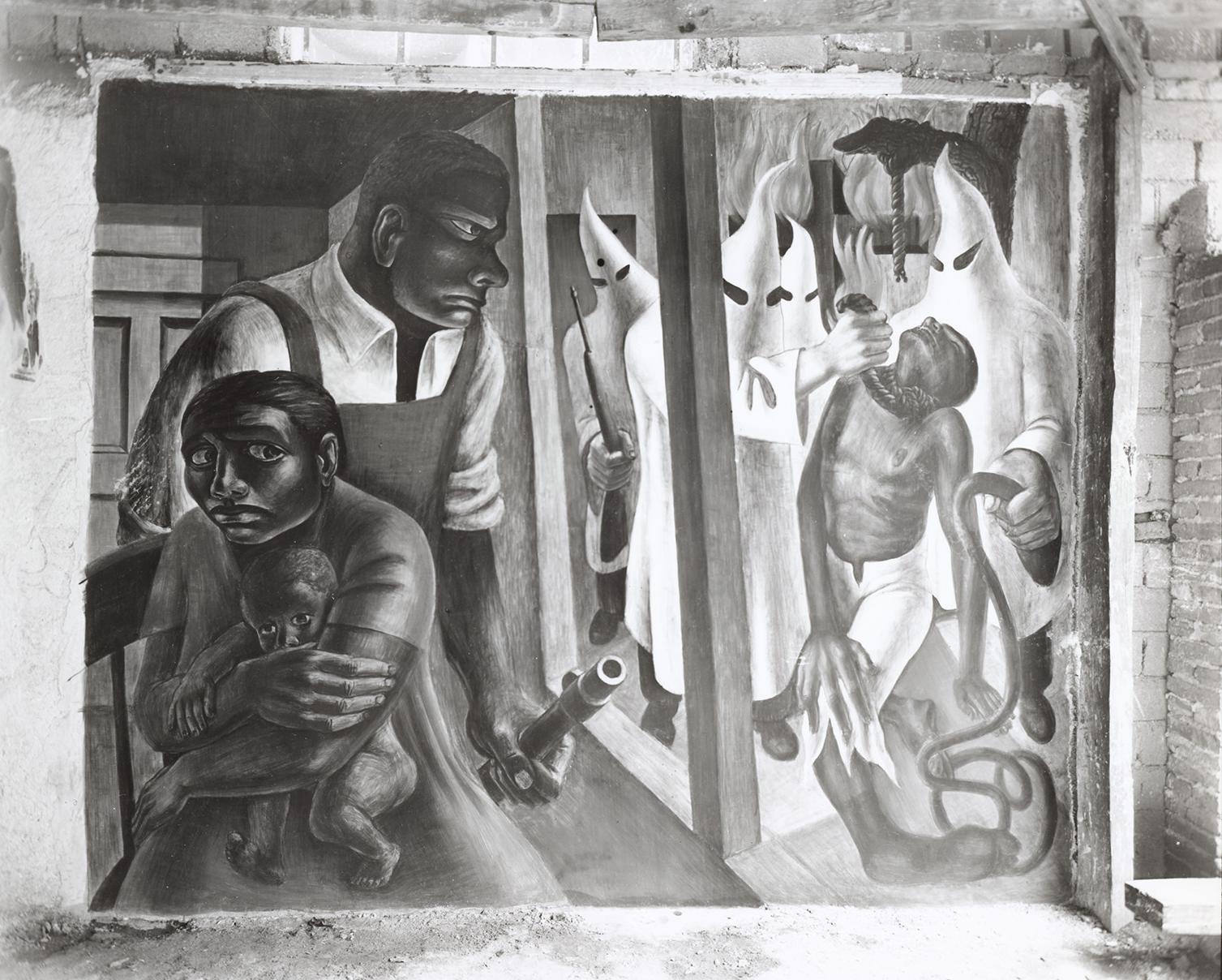 A Black man with a gun protects a mother and child on the left while hooded figures menace another man on the right.