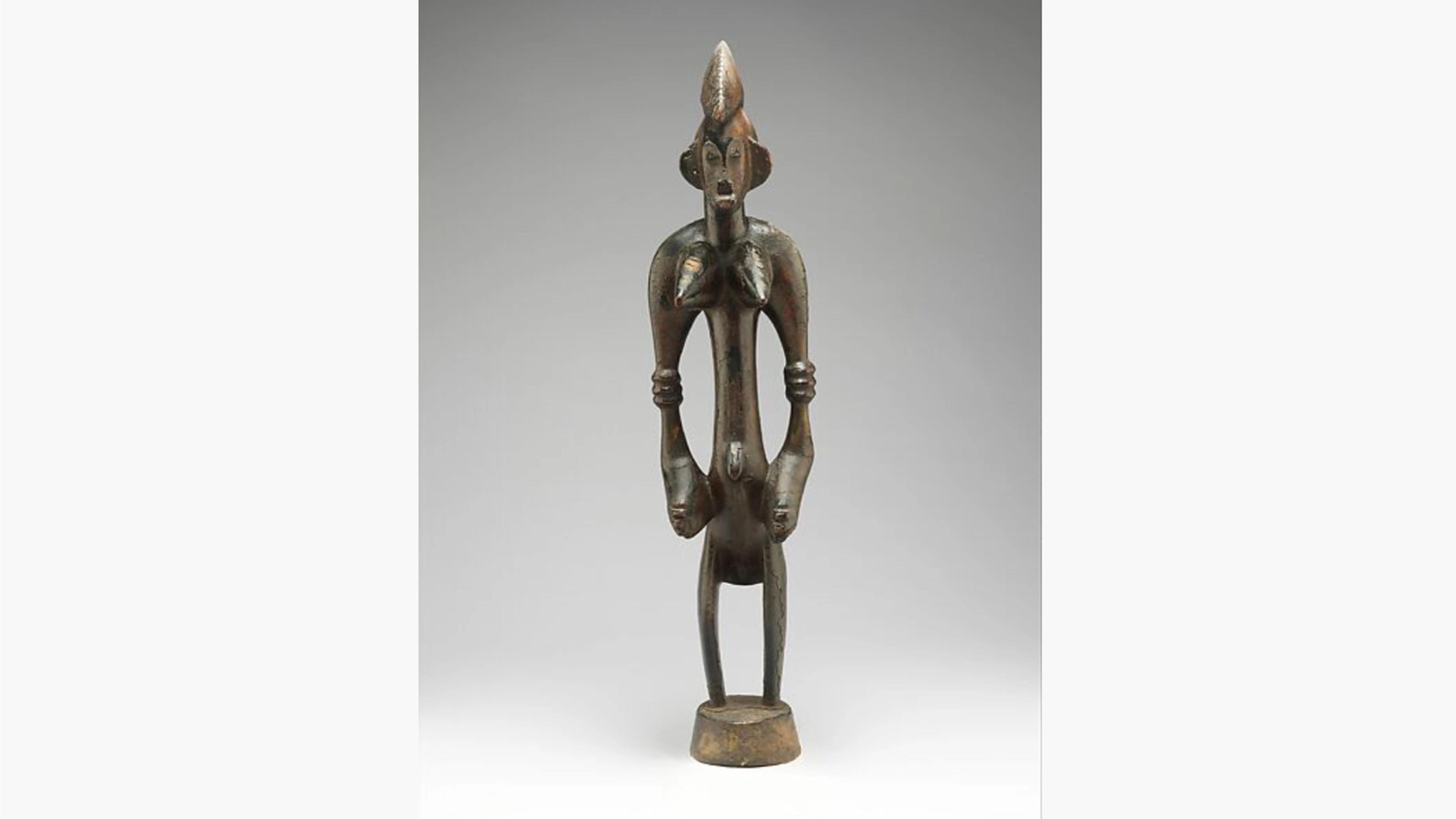Wooden female altar figure