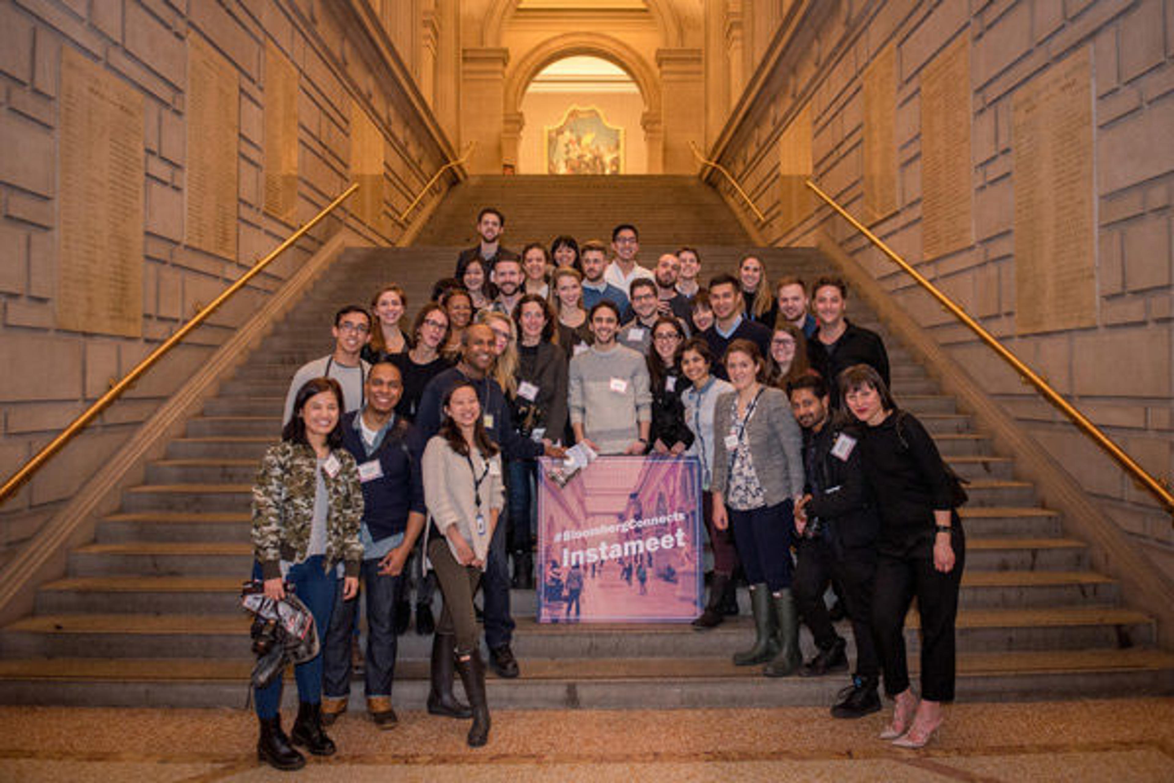 A group photo on the steps of the Great Hall