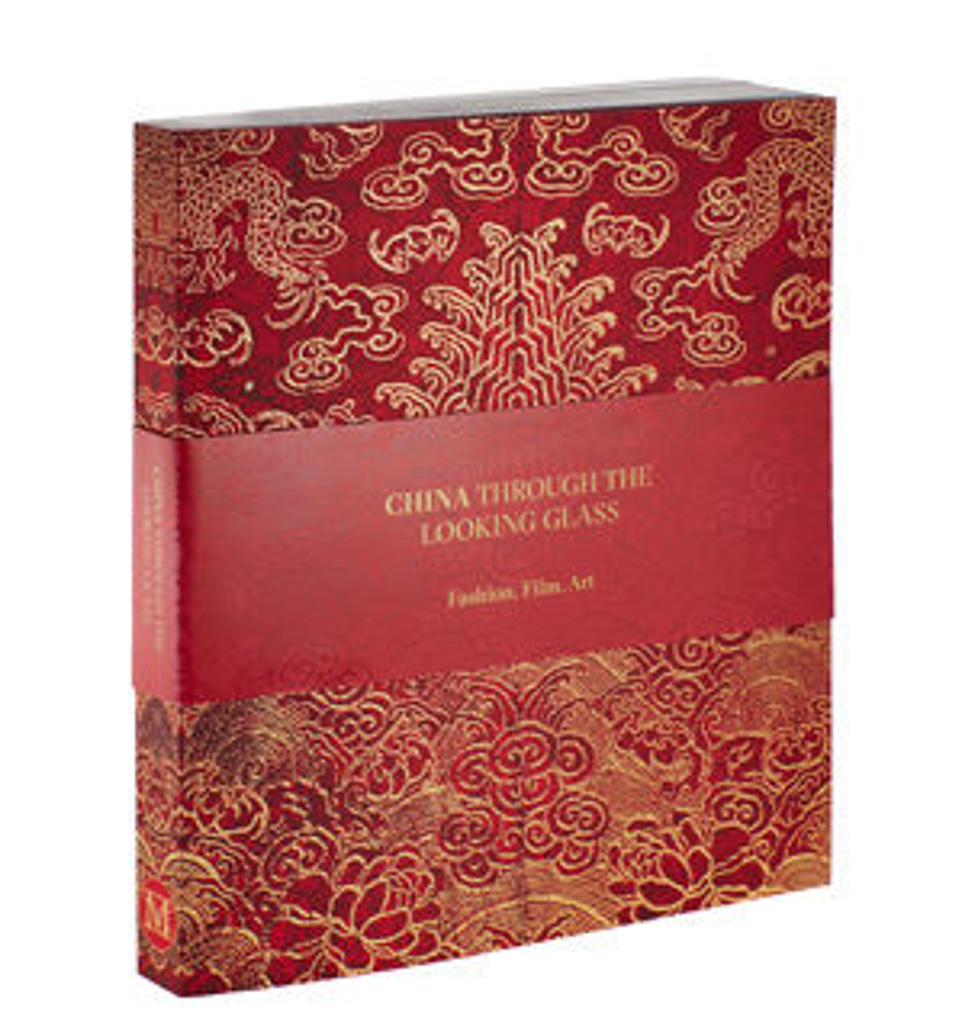 China: Through the Looking Glass, by Andrew Bolton with John Galliano, Adam Geczy, Maxwell K. Hearn, Homay King, Harold Koda, Mei Mei Rado, Wong Kar Wei and photography by Platon features 231 full-color illustrations and is available at The Met Store