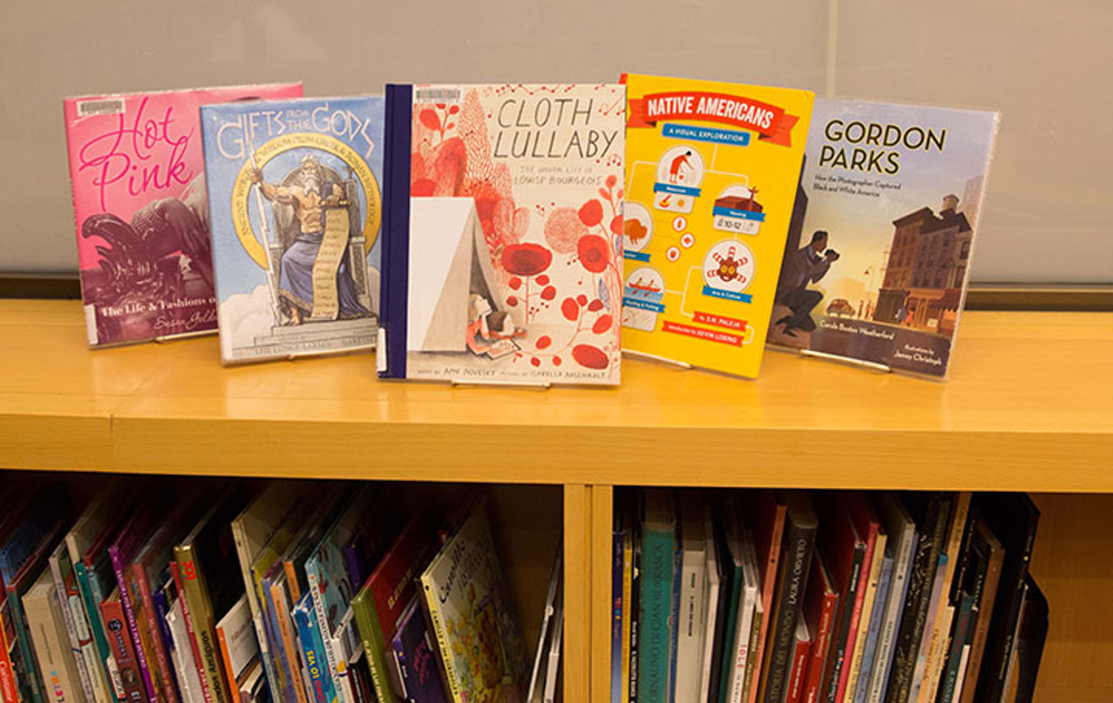 Five books displayed in the Nolen Library