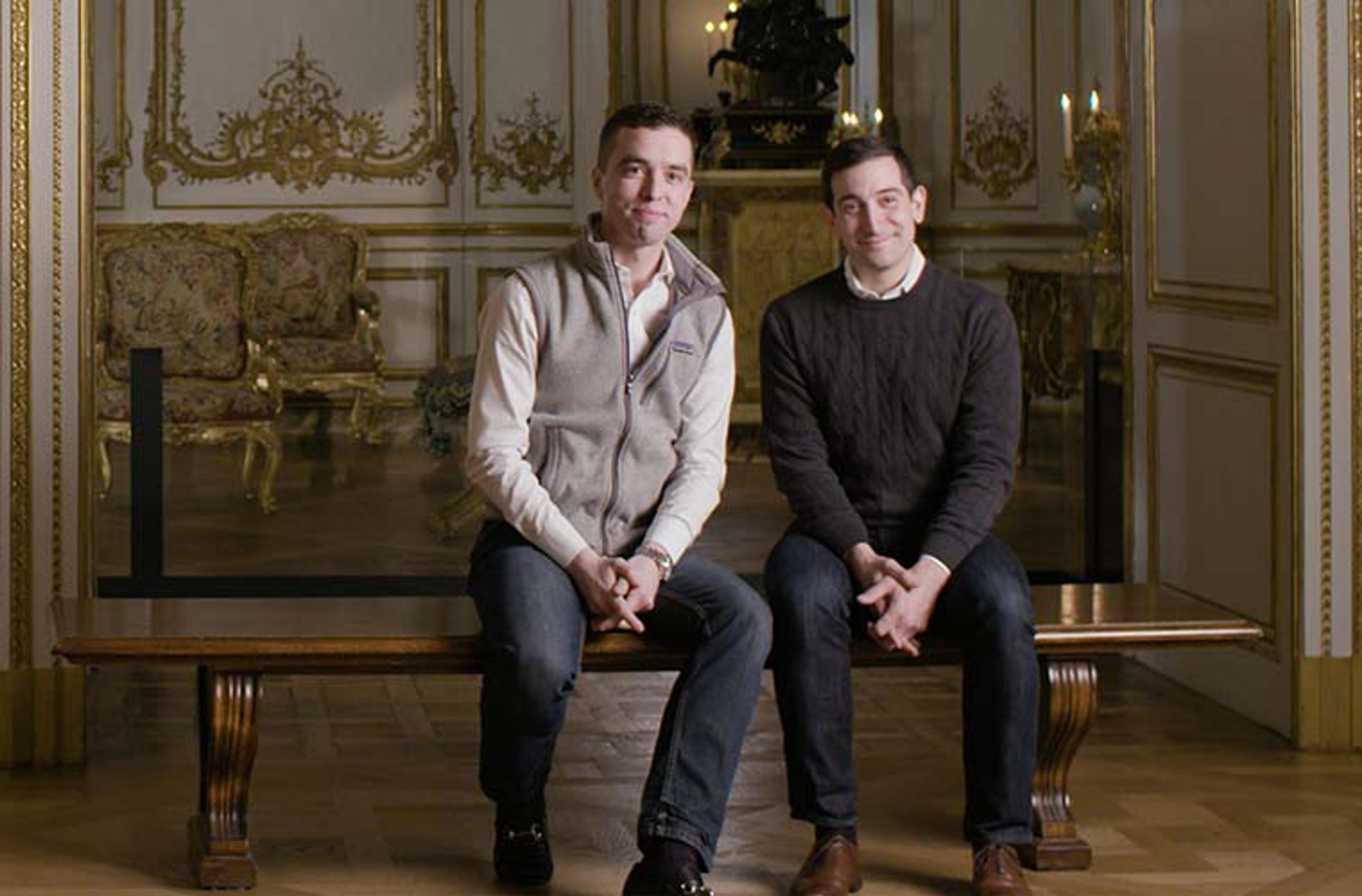 Two men, Jared Spencer and  Joshua Dumas, sat on a bench at The Metropolitan Museum of Art.