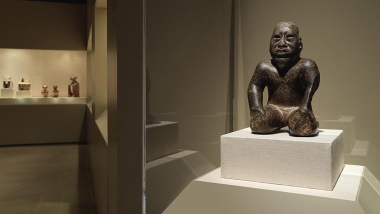 In gallery photo of the Olmec kneeling figure on view