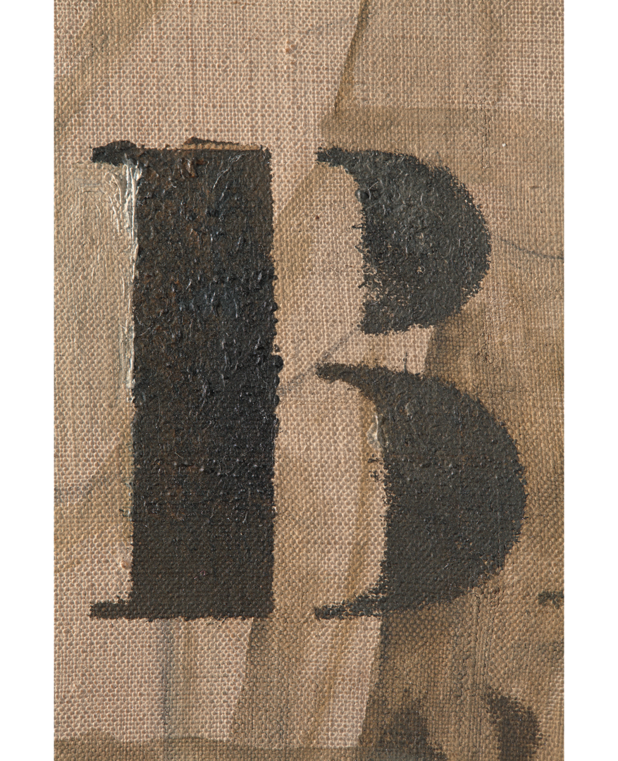 Painted letter “B” detail in “Bottle of Marc Vieux” showing the thick textured paint layer and the mark left by the stencil letter