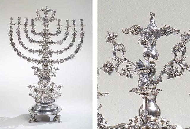 An ornate silver menorah with flowers, birds, and lions