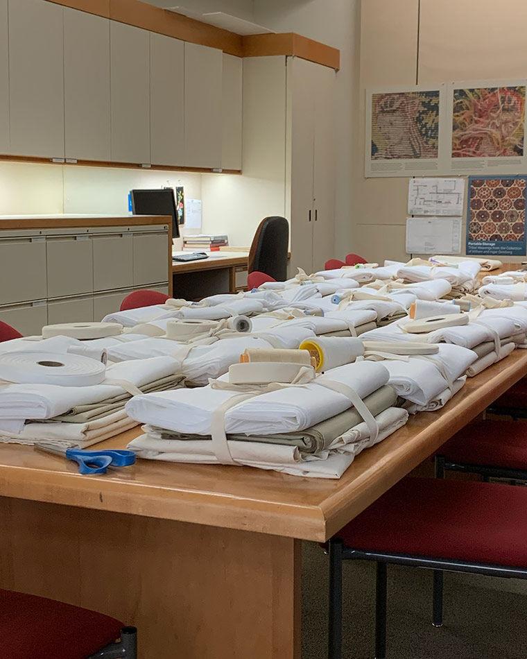 A stack of fabric on a table in a scientific lab