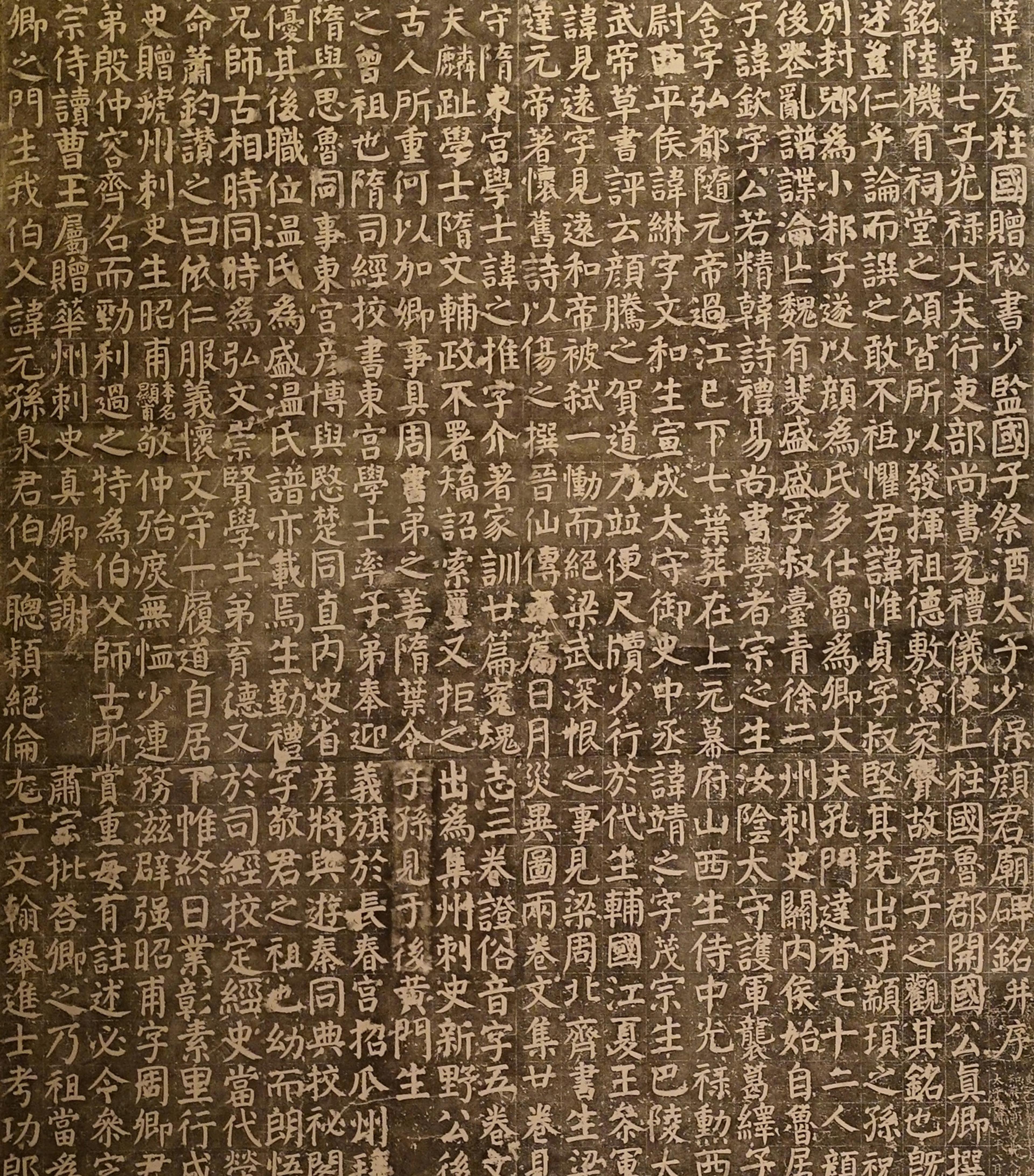 Brown scroll with white calligraphy