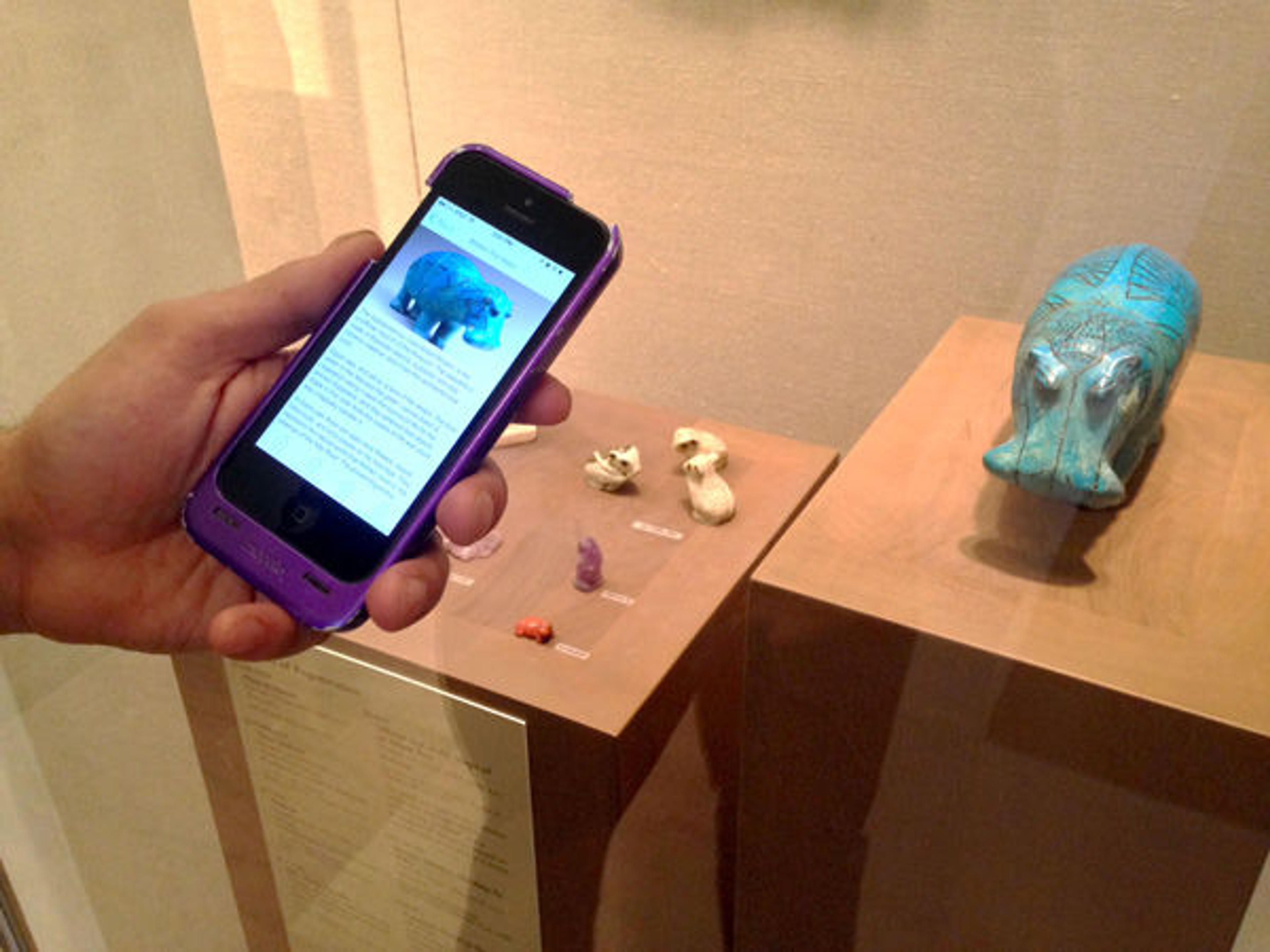 Exploring the galleries of Egyptian art using beacon technology. Photo by Don Undeen