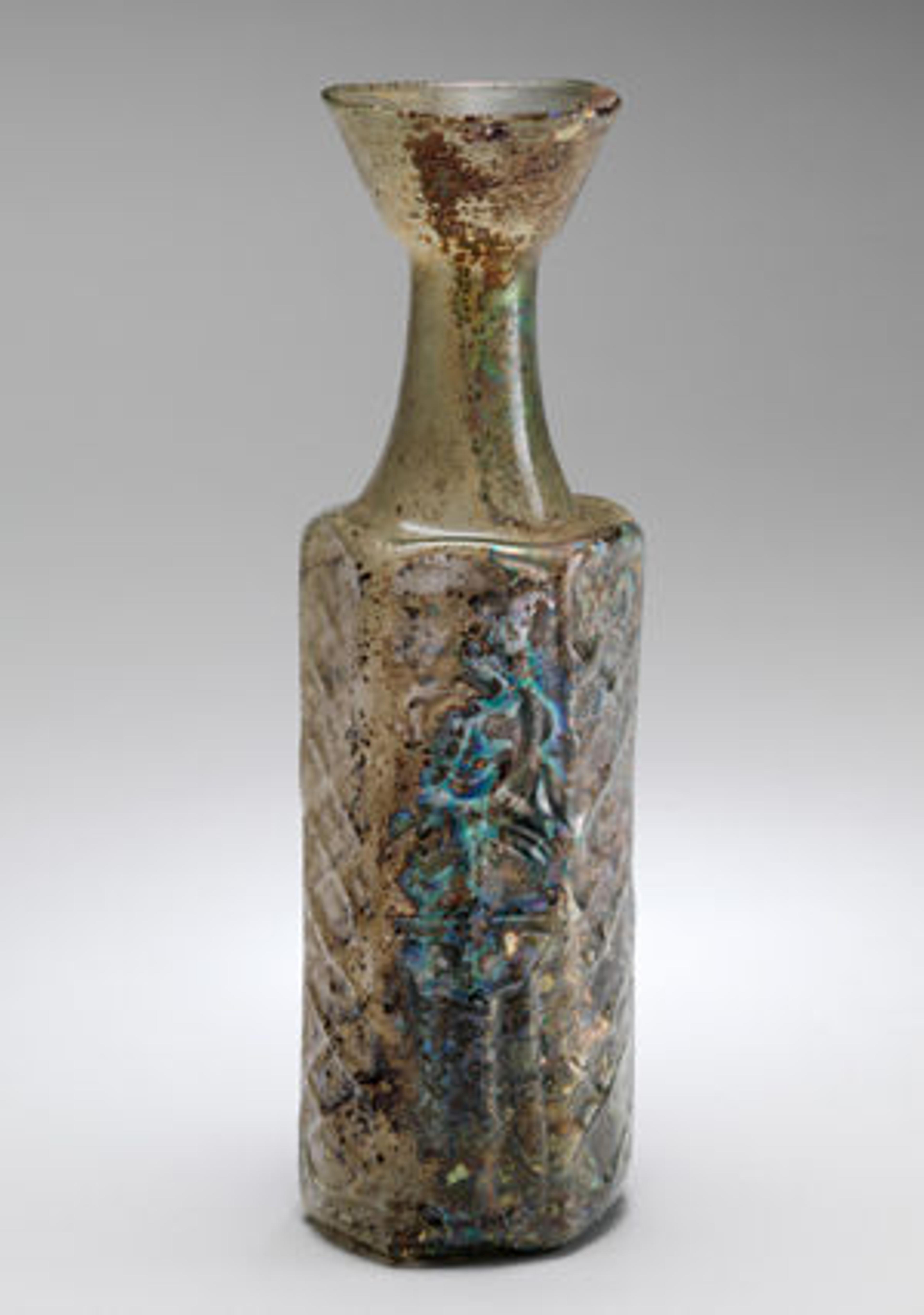 Yellow-Green Hexagonal Glass Bottle with a Stylite Saint (61.247)