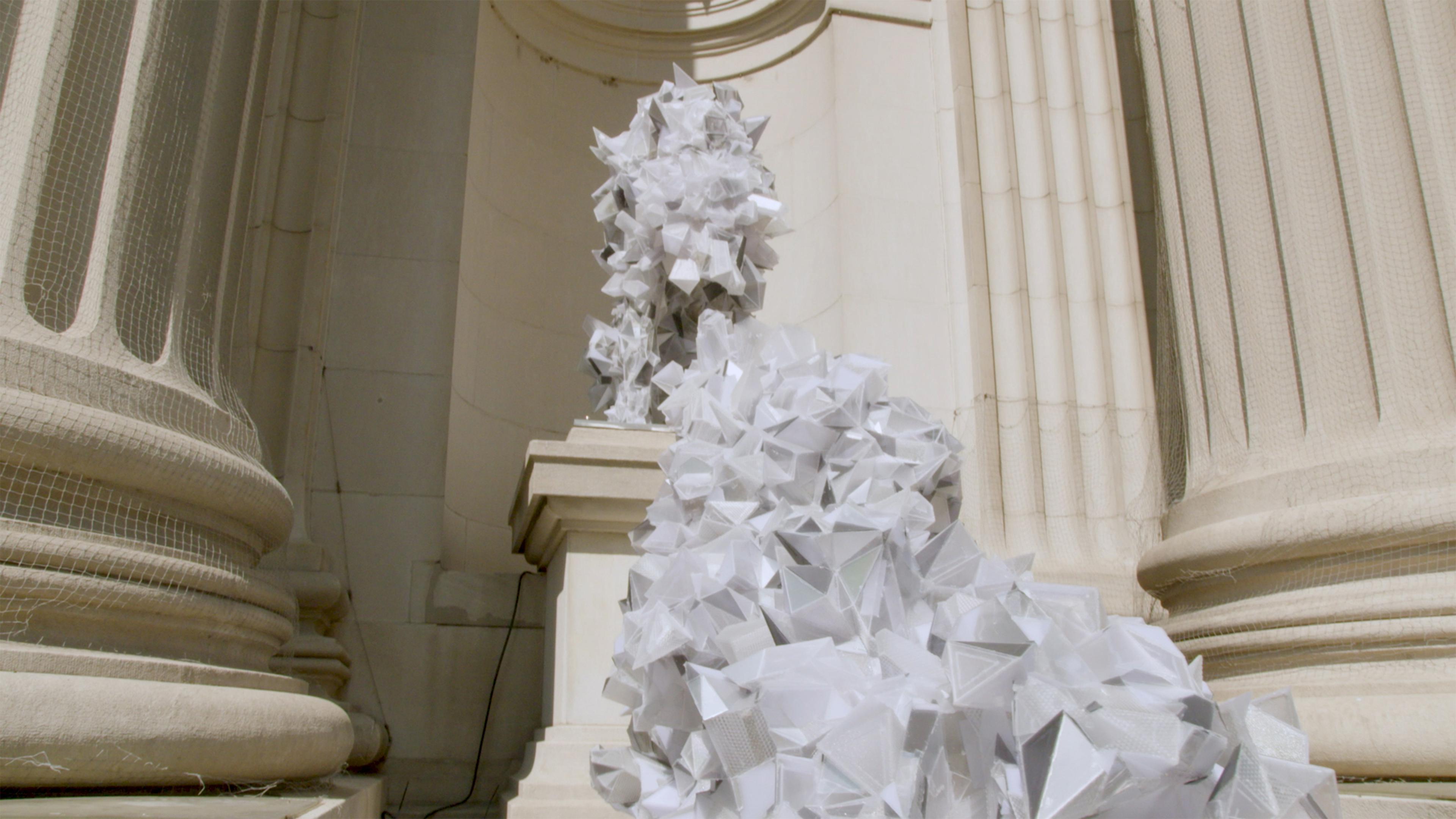 White shiny metal armor sculpture