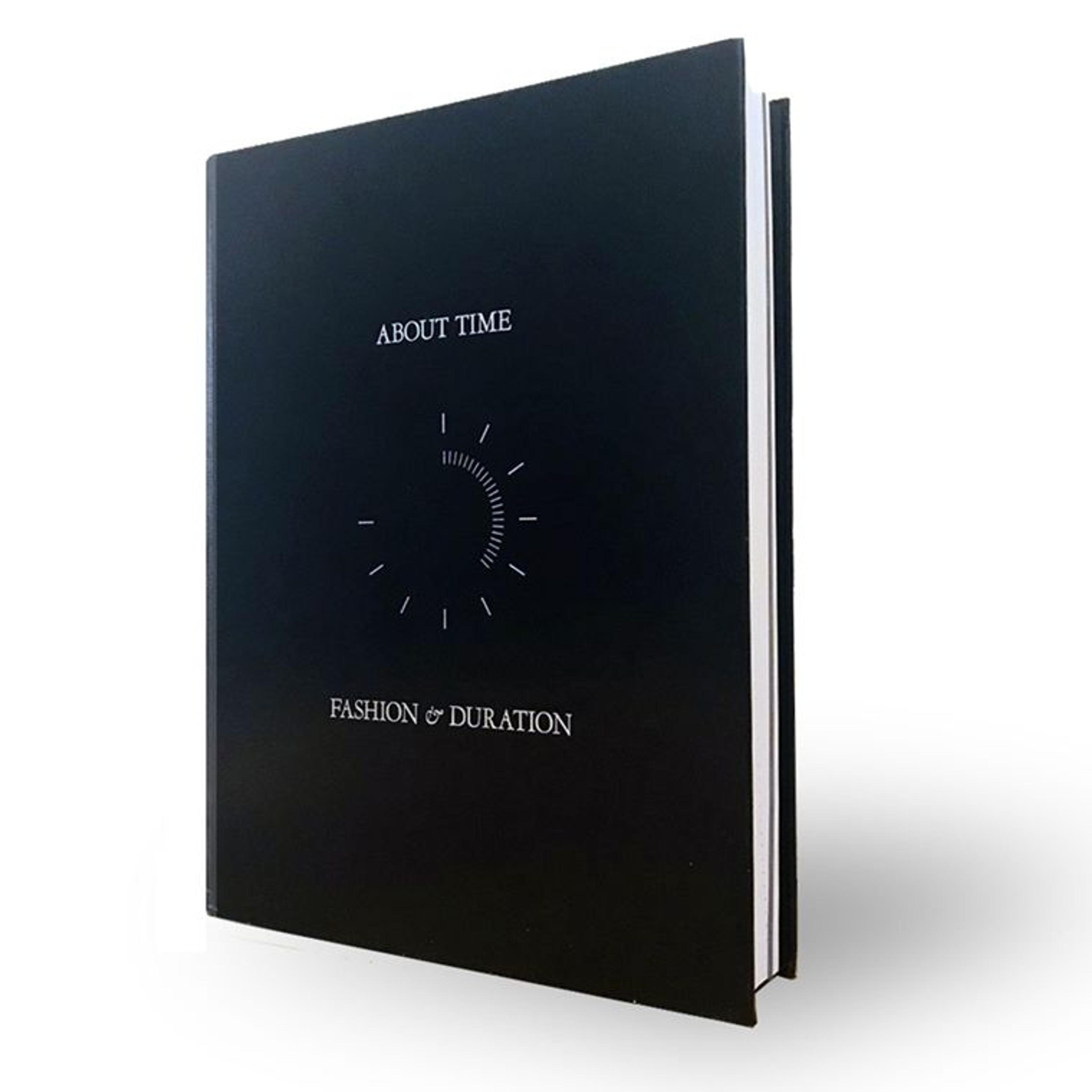 Cover of a black book titled "About Time"