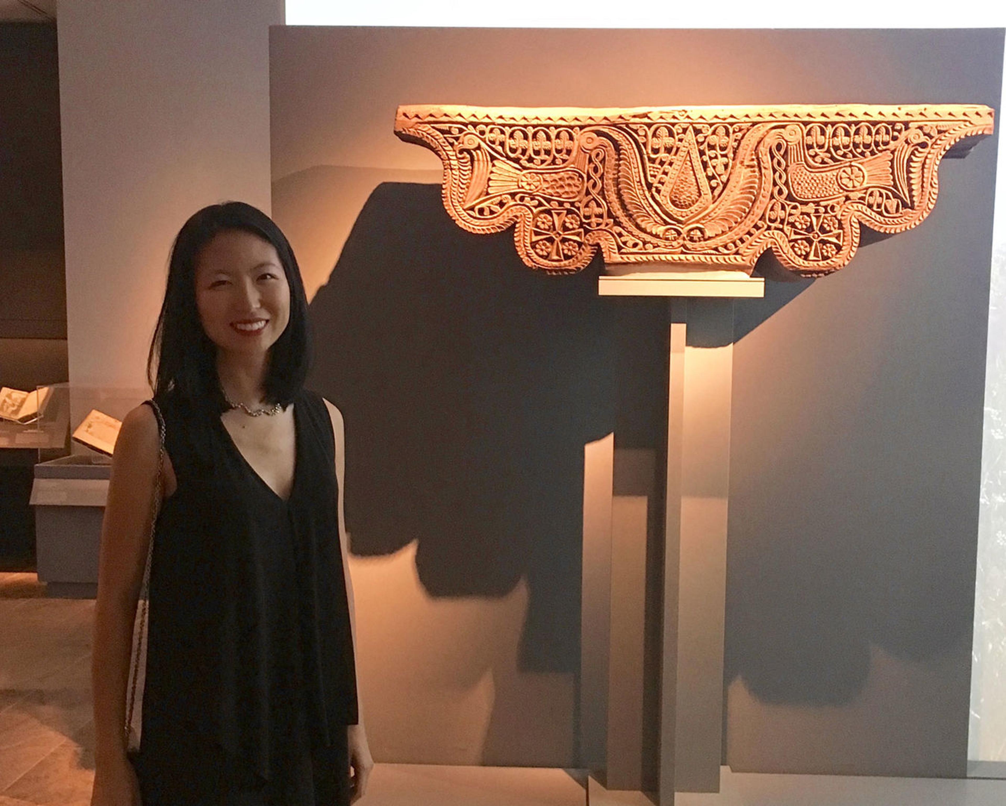 Intern Ernestine Qiu in the gallery
