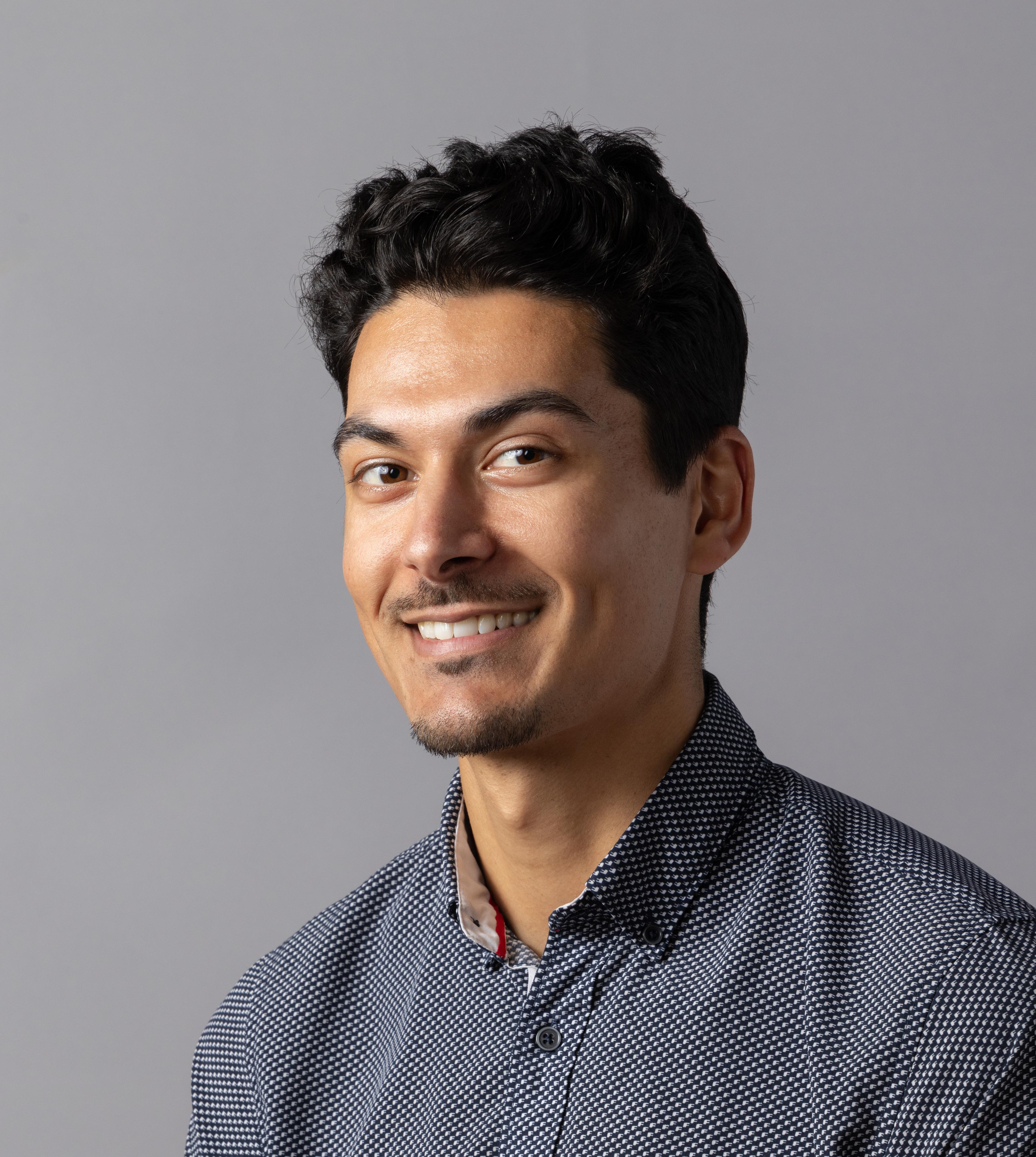 Headshot of David Varghese