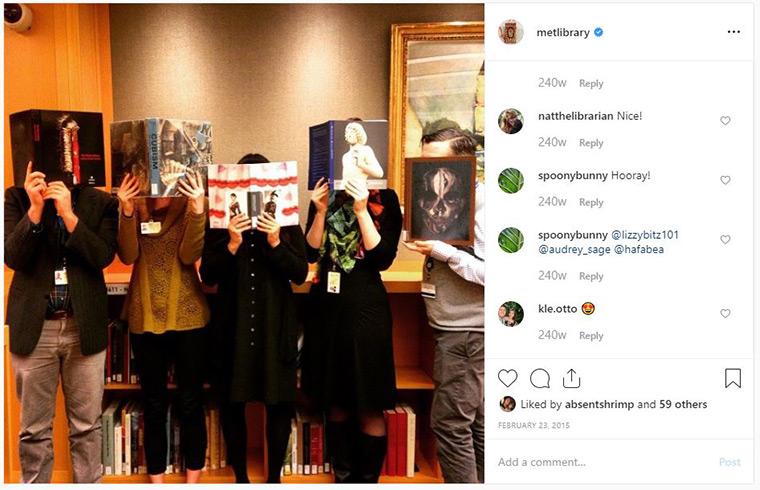 Five librarians with books in front of their faces