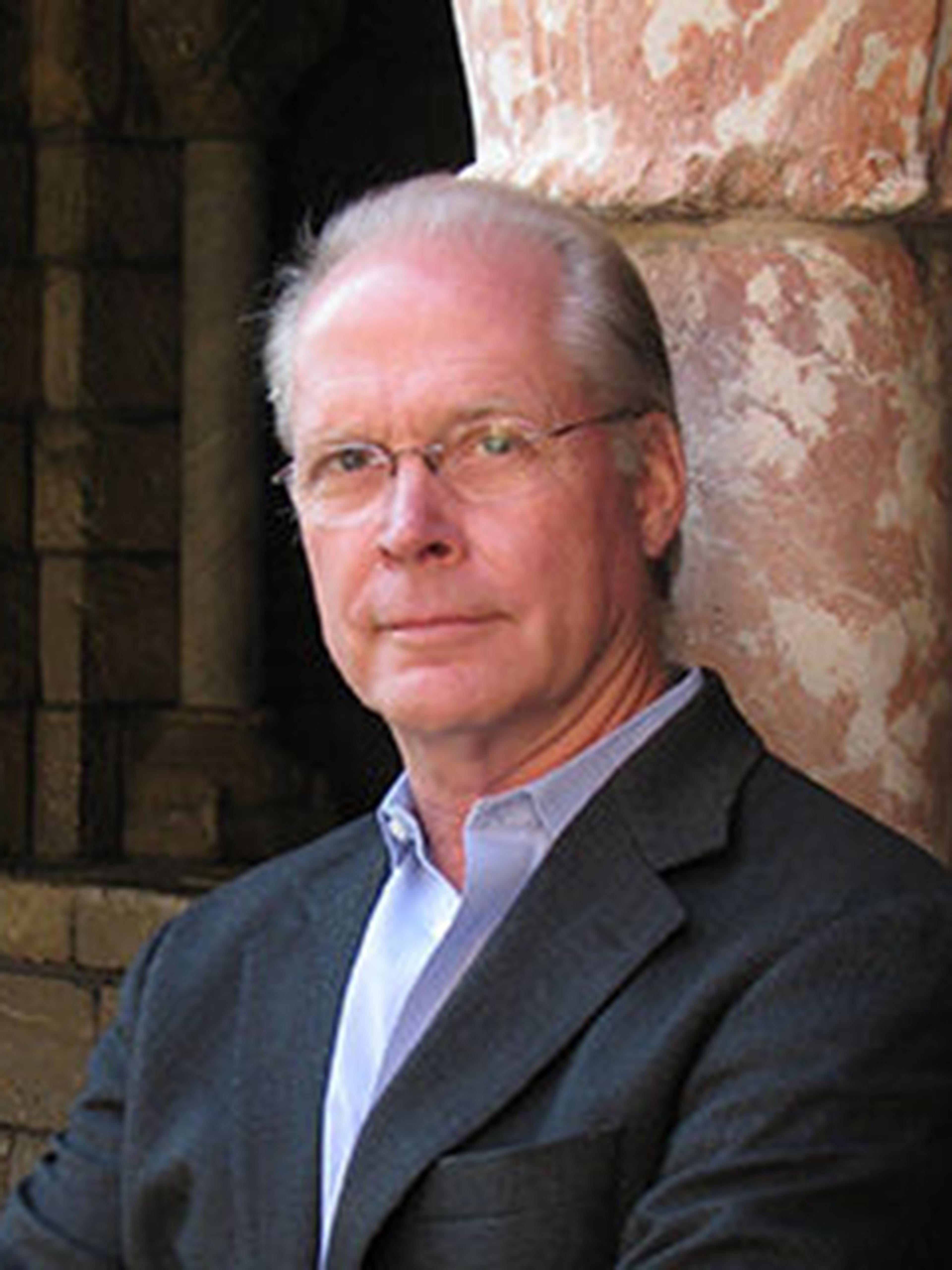 Headshot of Timothy B. Husband