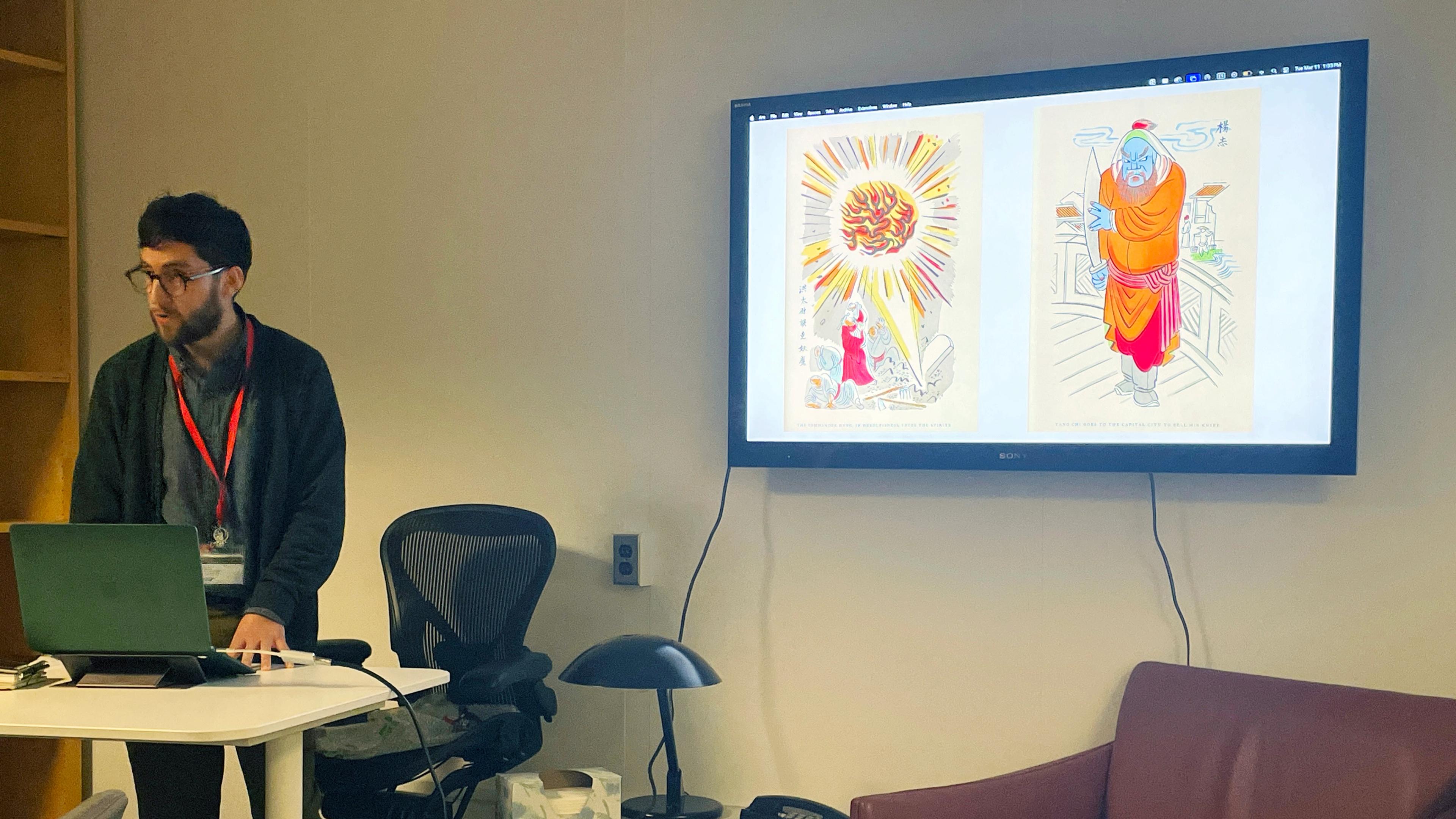 Fellow Rodrigo S.M., presenting his work in the Lauder Research Center Library