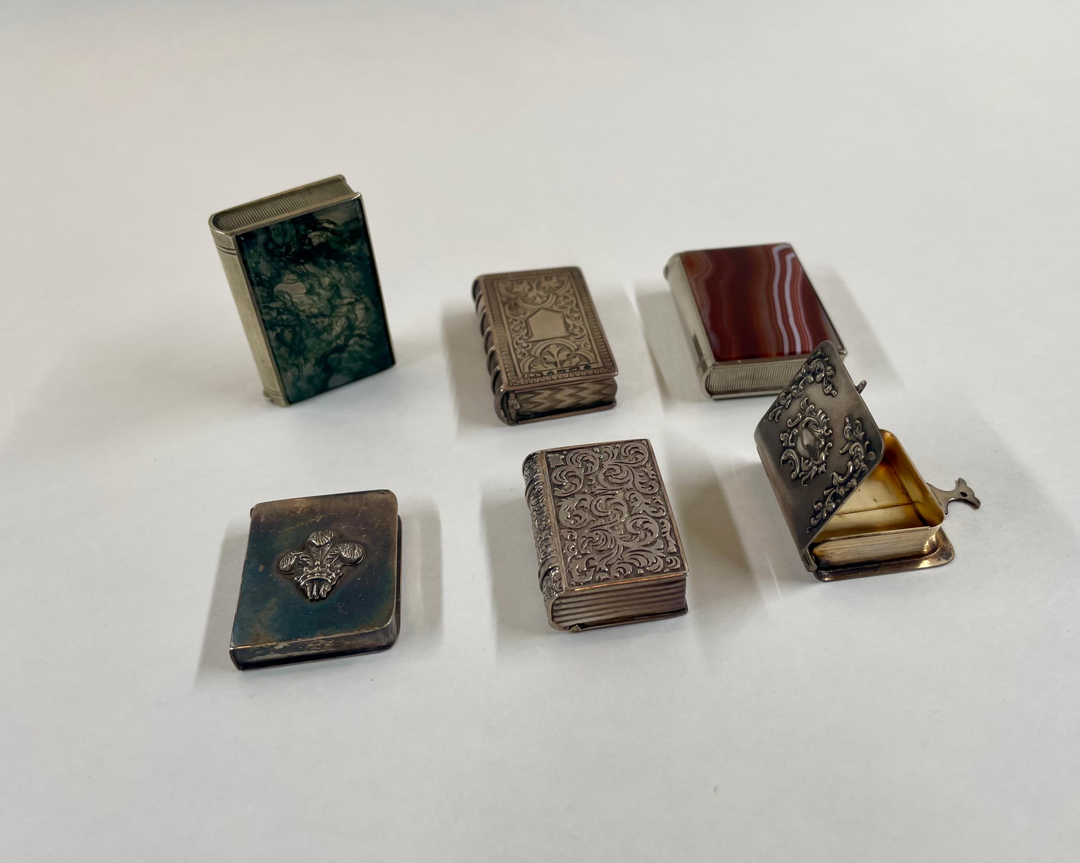 Six blooks on a white background, one blook open