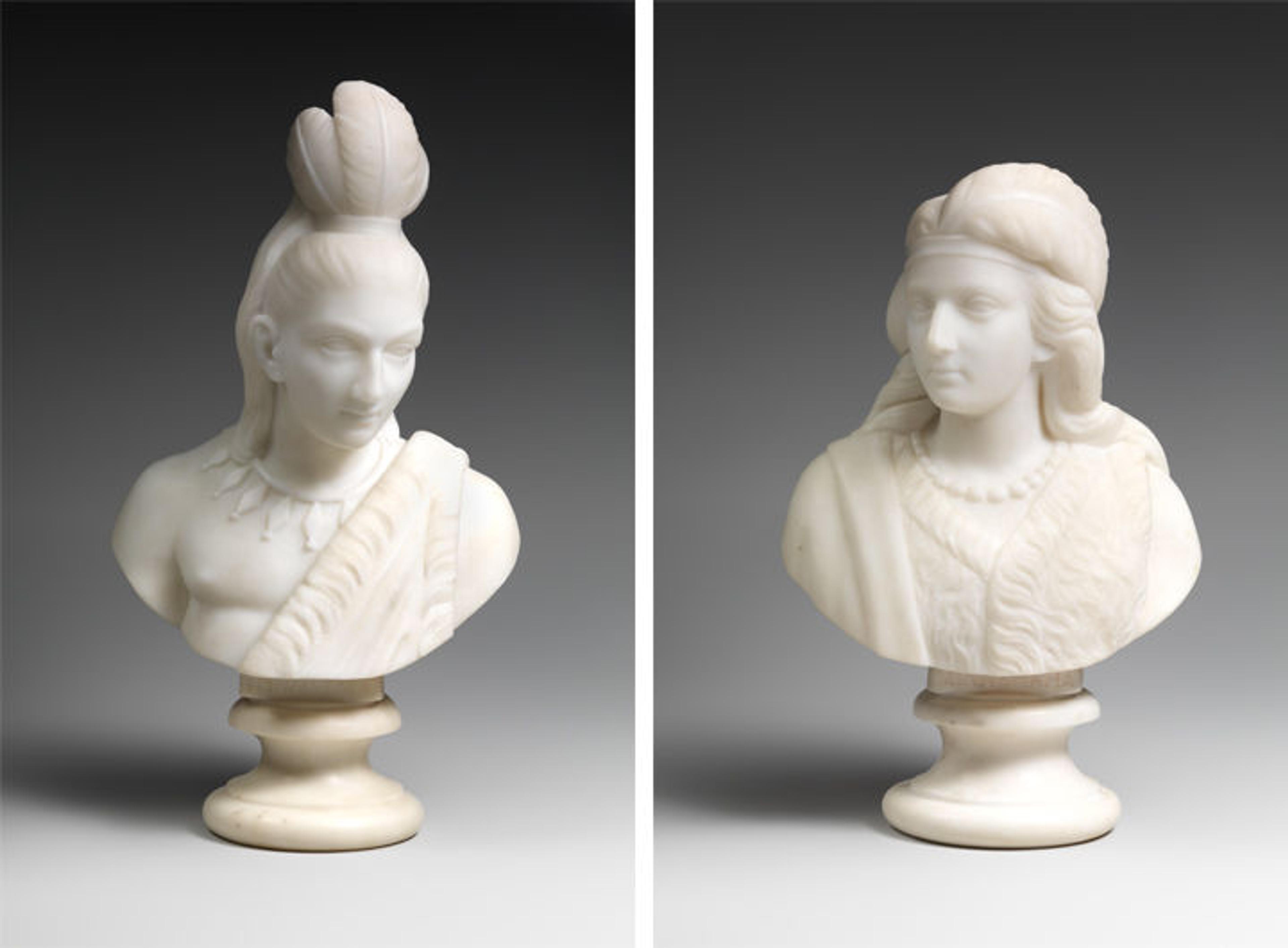 Two white marble busts show Hiawatha and Minnehaha based on Longfellow's poem, The Song of Hiawatha.