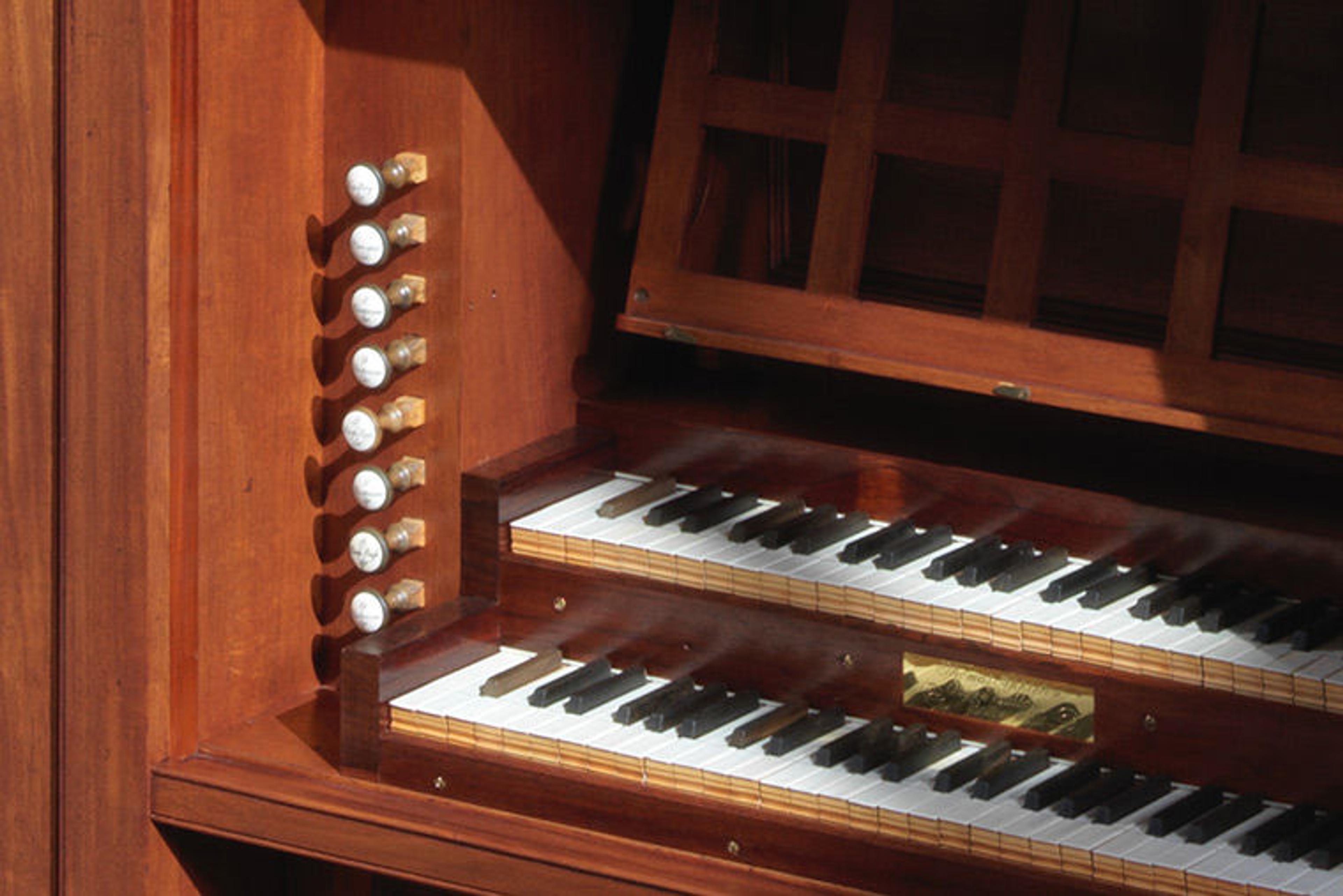 Detail of the keys and left-hand stops on the Thomas Appleton organ.