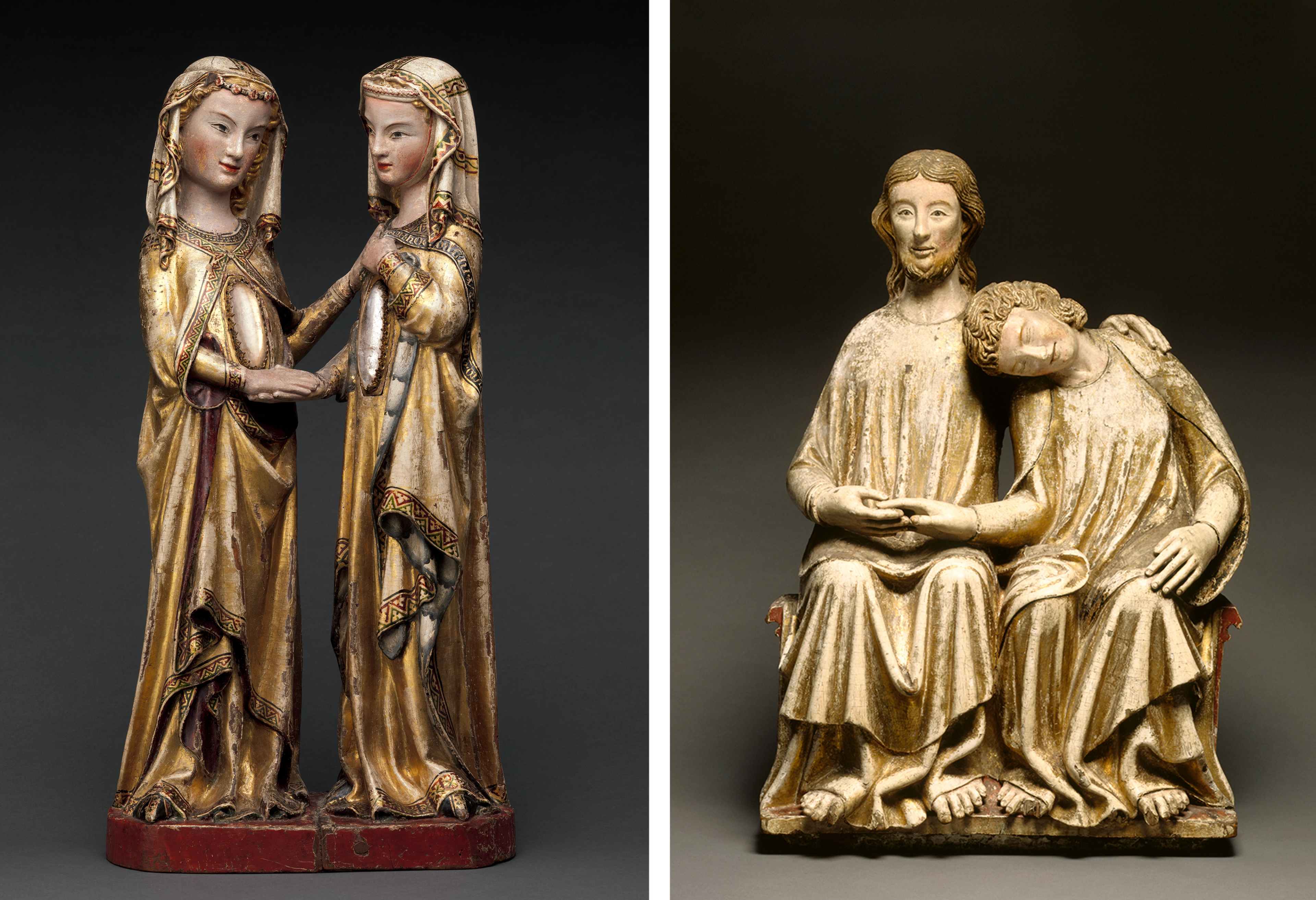 Sculptural pairs with religious figures. At left, two women stand holding hands. At right, seated male figures rest together with one's head on the other's shoulder.