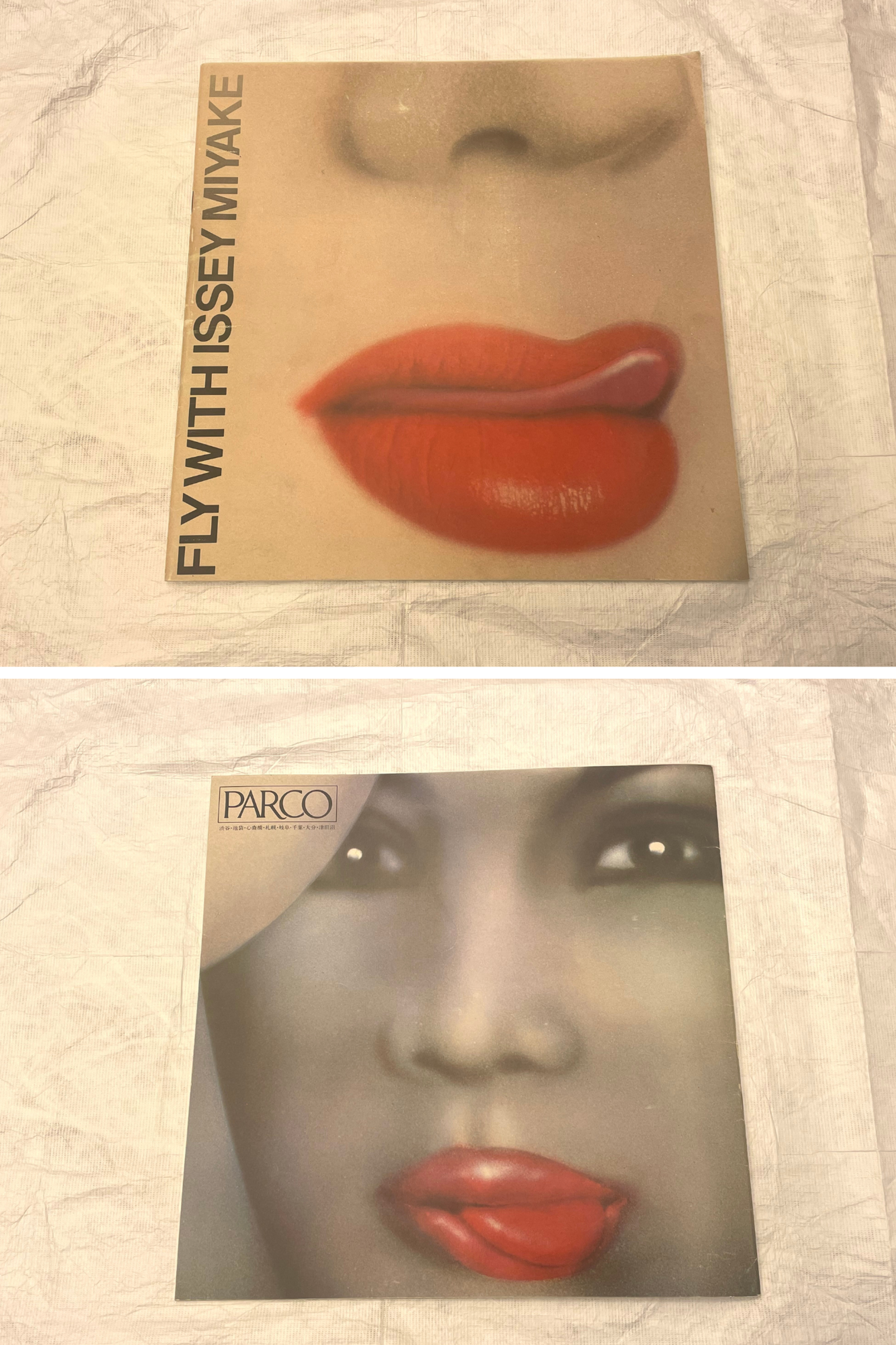 Two pamphlets featuring lips with bright red lipstick